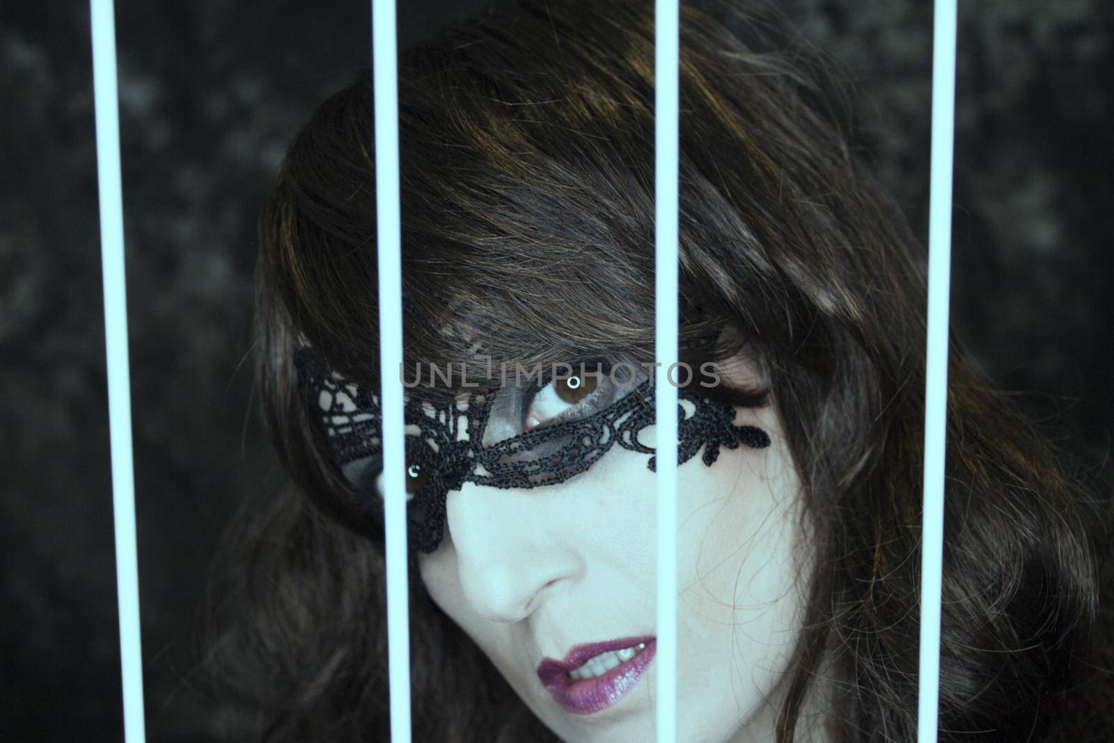 Woman disguised in gothic style for halloween party with mask