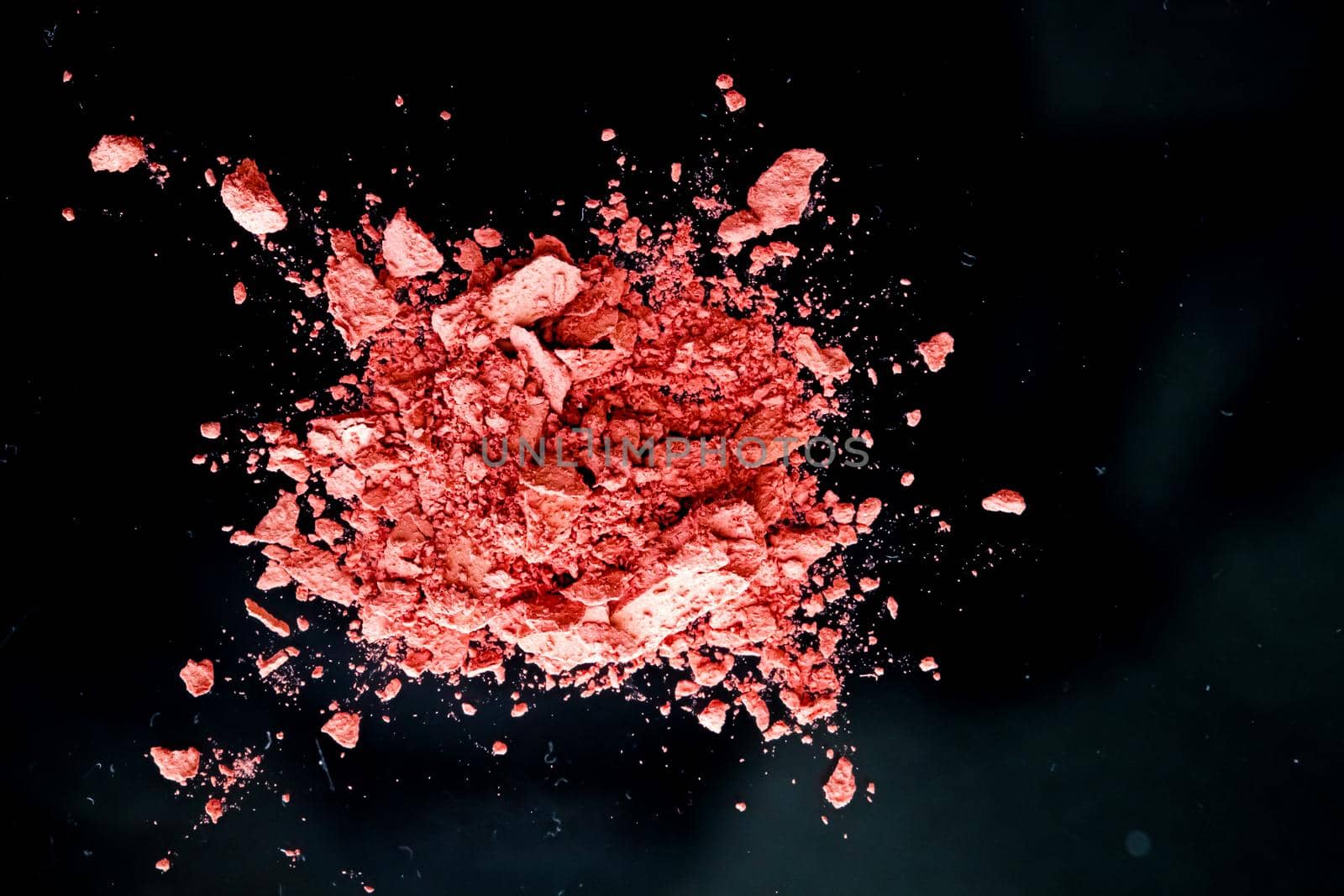 Crushed cosmetics, mineral organic eyeshadow, blush and cosmetic powder isolated on black background, makeup and beauty banner, flatlay design.