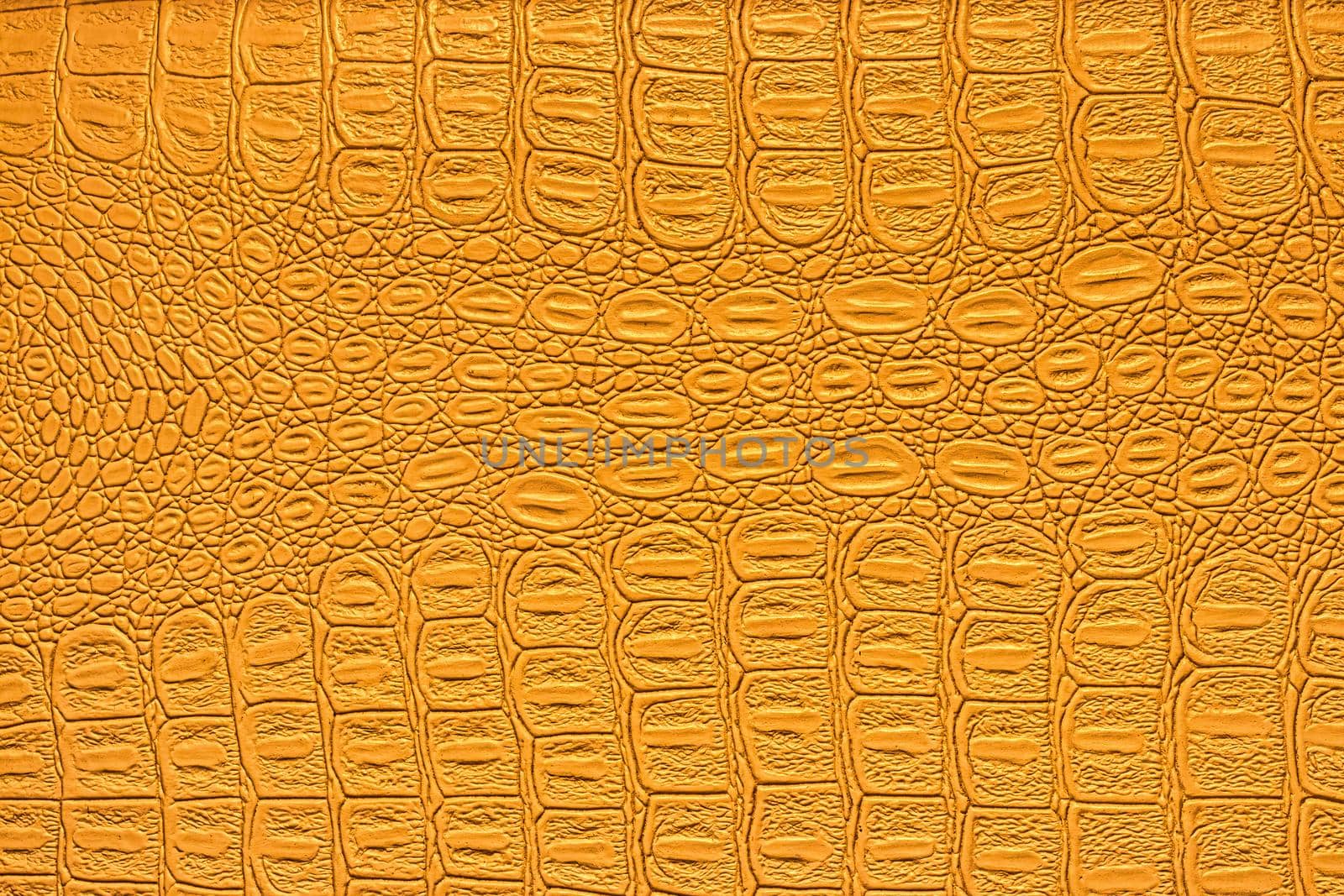 Orange crocodile leather texture. Abstract backdrop for design. by Eugene_Yemelyanov