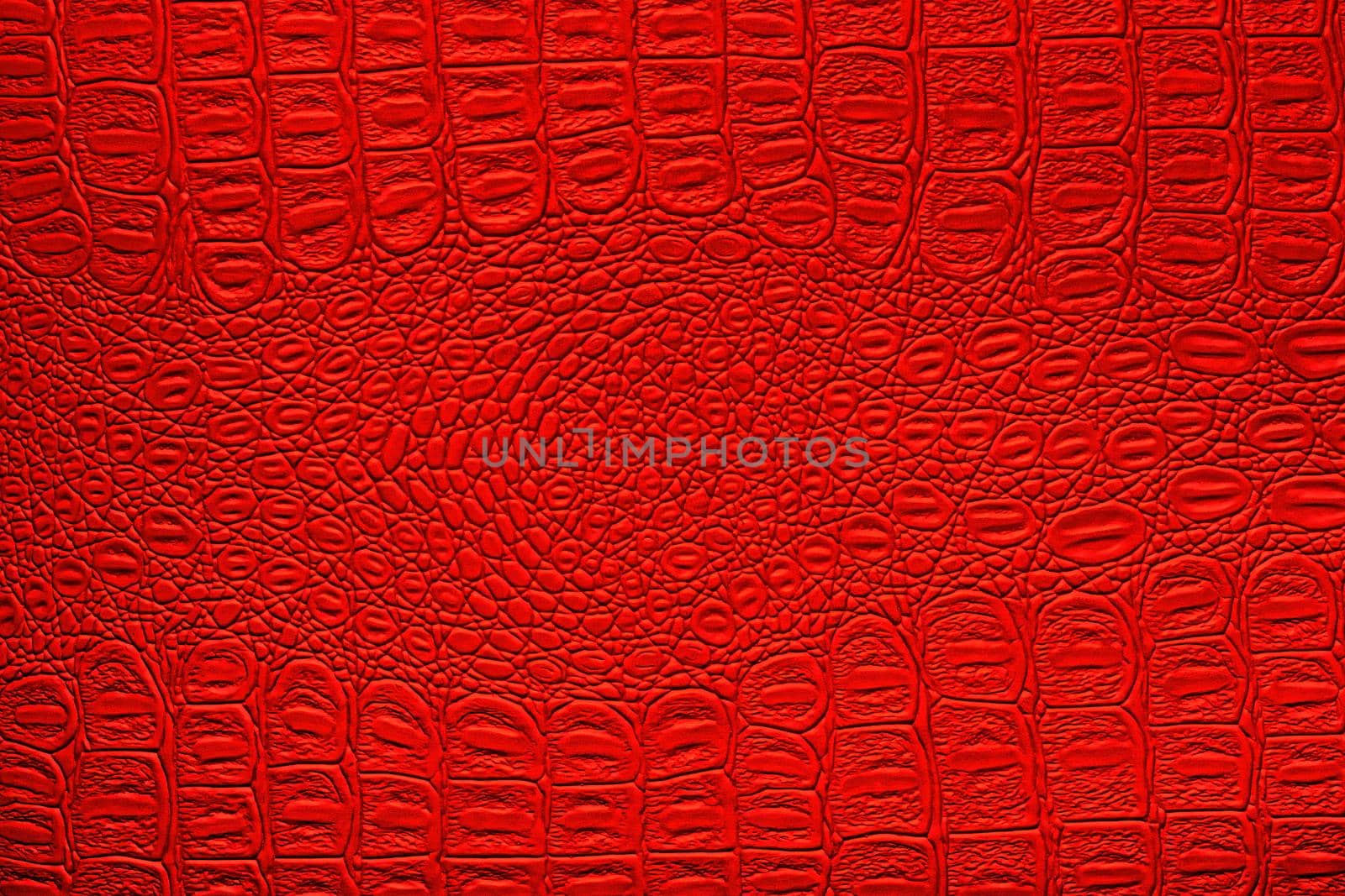 Red crocodile leather texture. Abstract backdrop for design. by Eugene_Yemelyanov