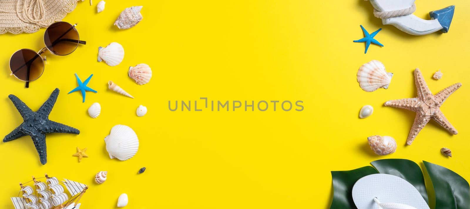 Summer beach design concept with shells, hat, slipper on yellow background. by ROMIXIMAGE