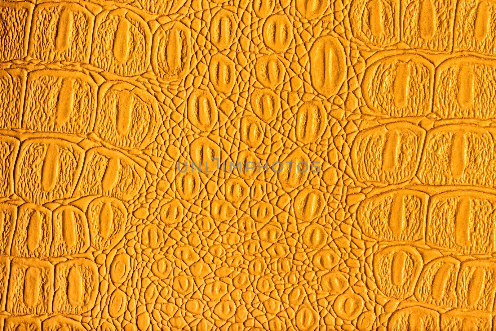 Orange crocodile leather texture. Abstract backdrop for design. by Eugene_Yemelyanov