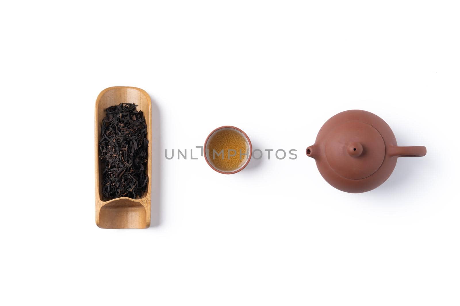 Top view of fresh black tea with kettle teapot and leaves in Taiwan, Asian culture design concept layout.