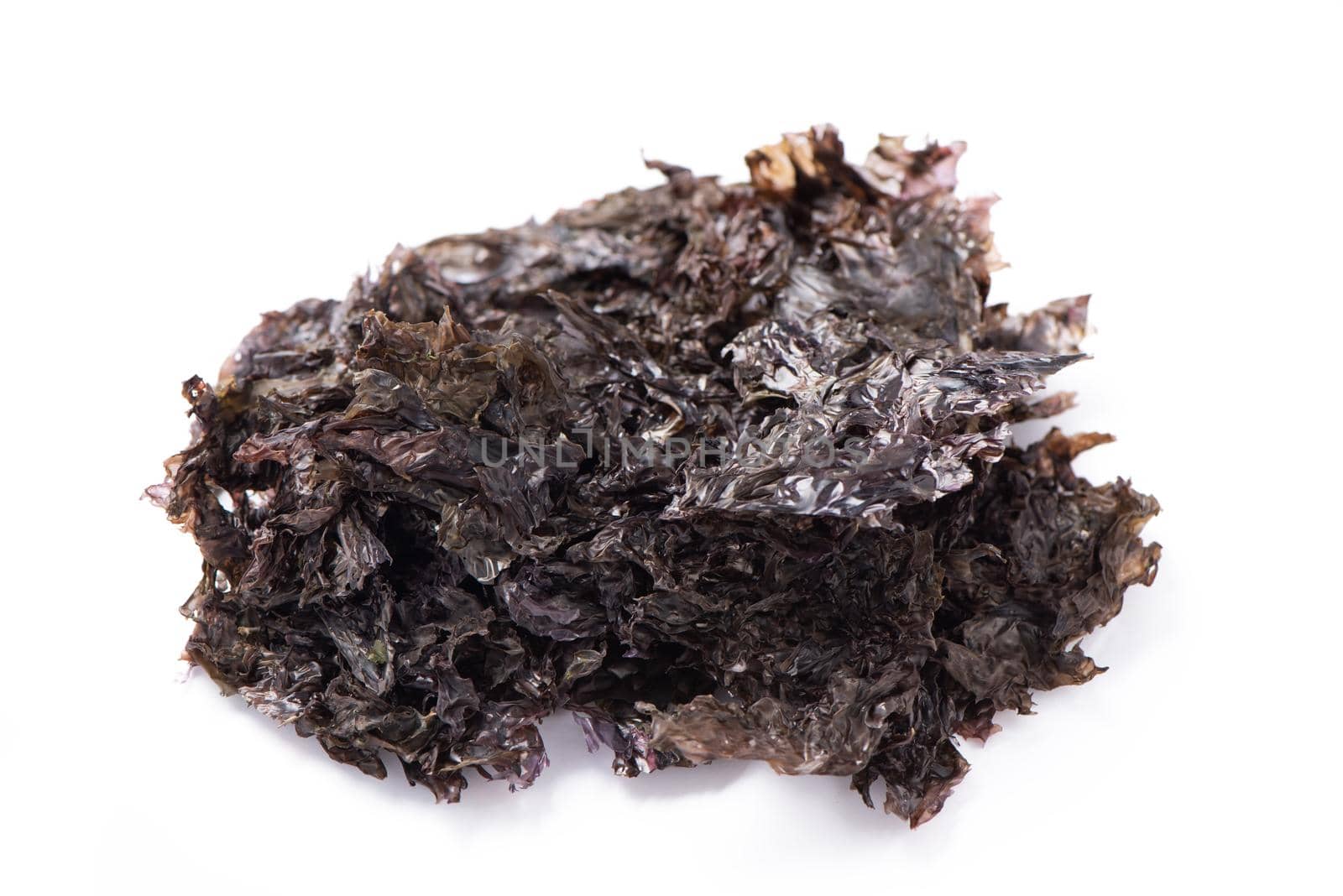 Close up of dried seaweed sheet healthy food isolated on white table background