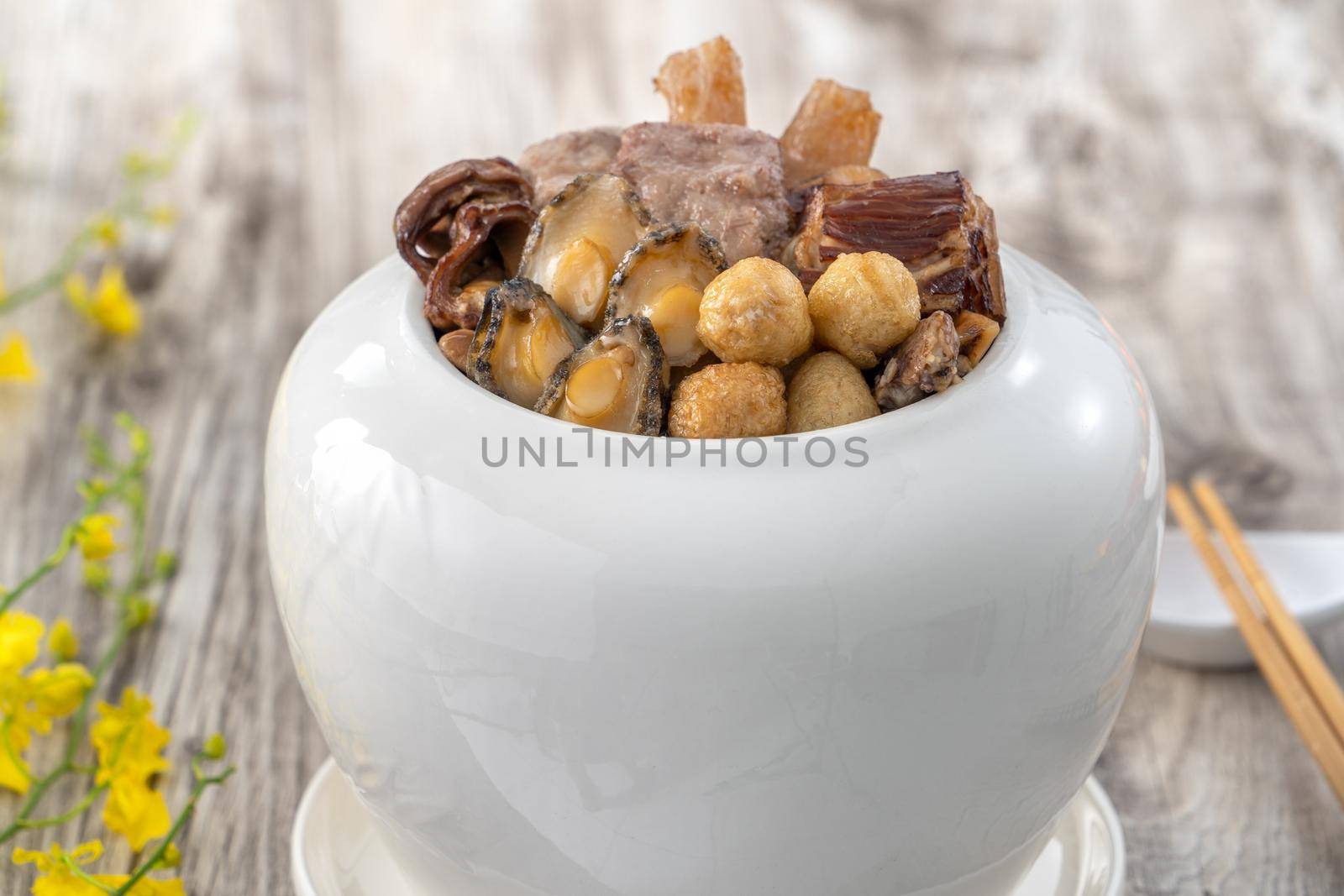 Traditional food of Chinese lunar new year, Buddha jumps over the wall, Chinese Soup Casserole dish, Buddha's Temptation, named Fo Tiao Qiang, close up.