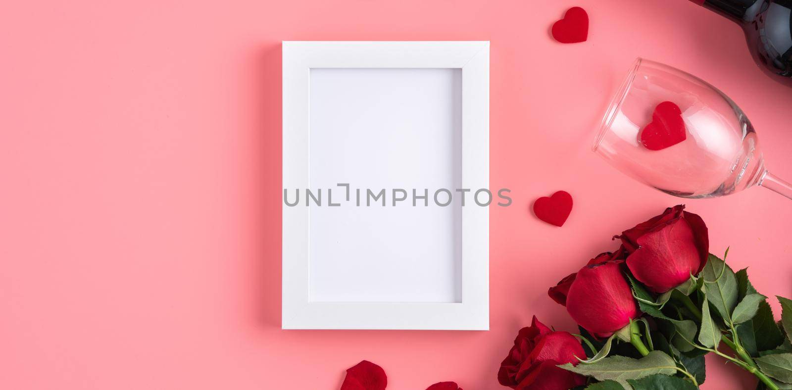 Valentine's Day memory with picture frame concept on pink background by ROMIXIMAGE