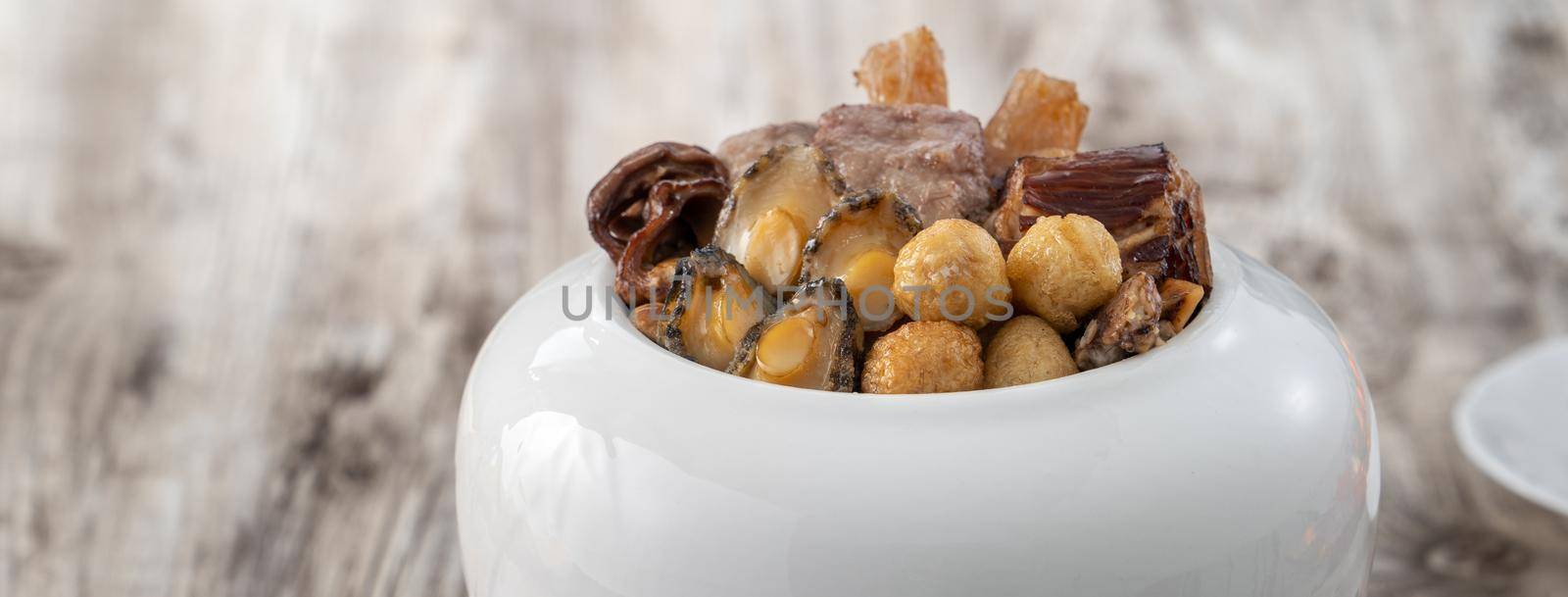 Traditional food of Chinese lunar new year, Buddha jumps over the wall, Chinese Soup Casserole dish, Buddha's Temptation, named Fo Tiao Qiang, close up.