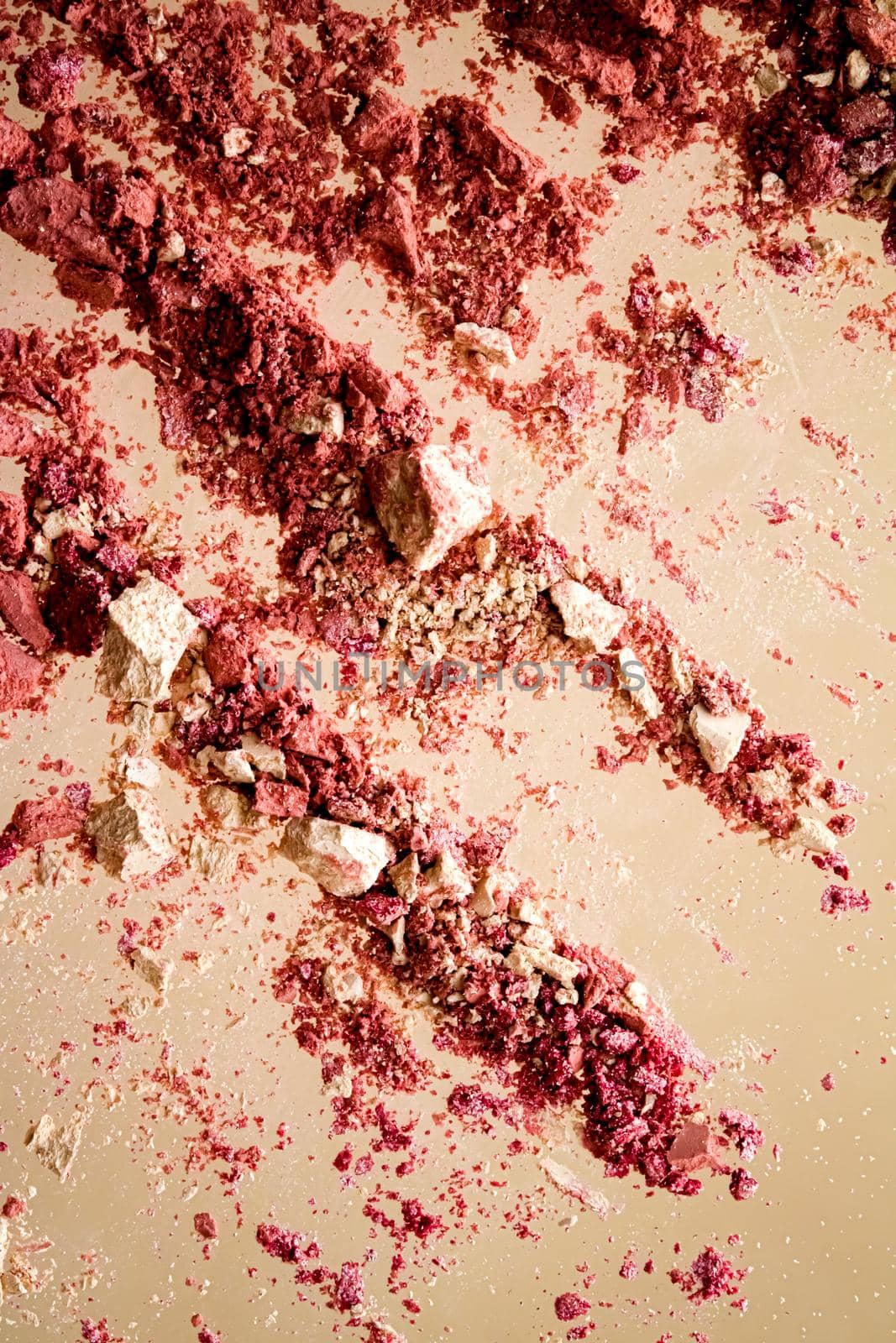 Crushed cosmetics, mineral organic eyeshadow, blush and cosmetic powder isolated on golden background, makeup and beauty banner, flatlay design.