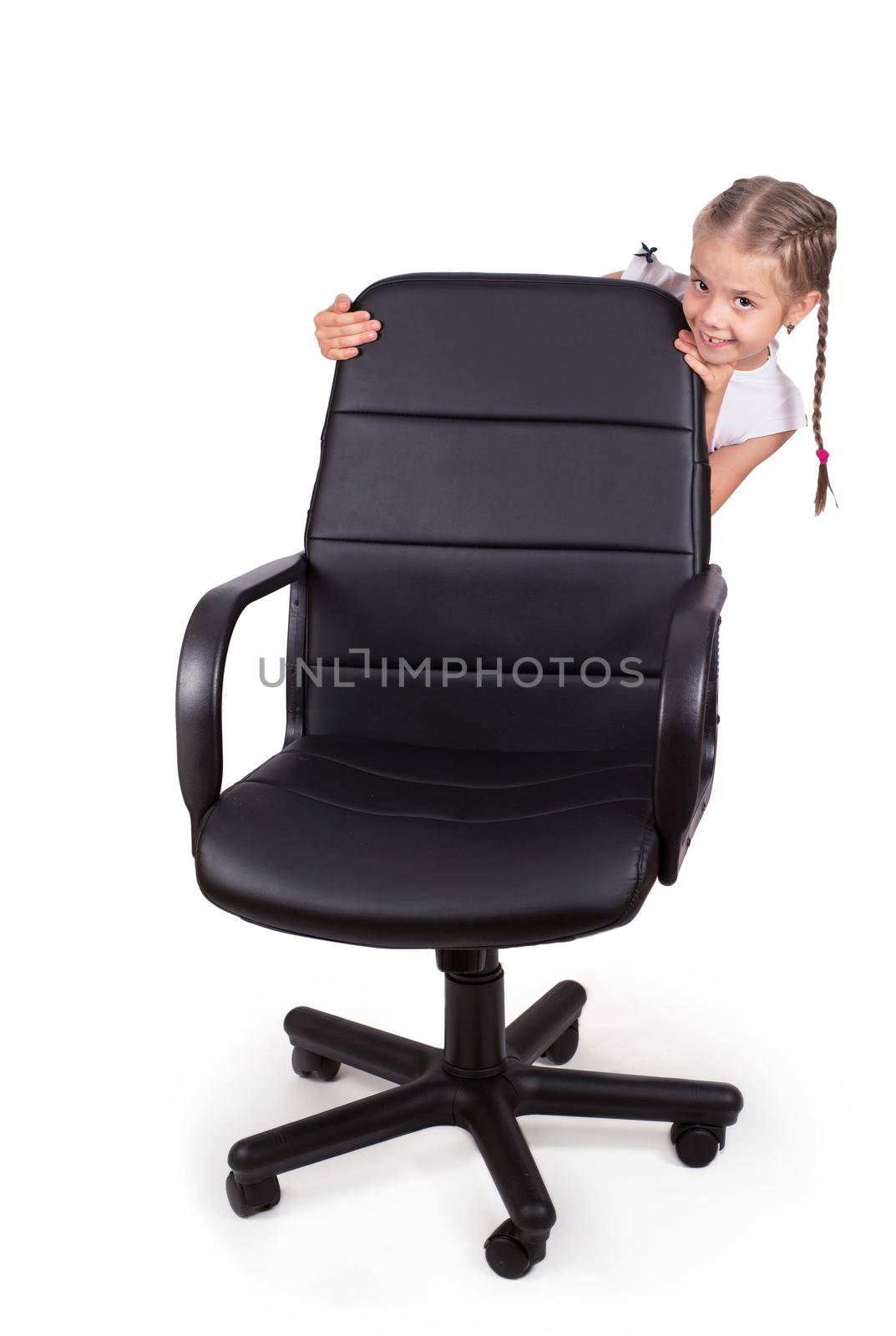 Office chair office chair and little cheerful girl isolated on white background. Modern adjustable chair from black leather. by aprilphoto