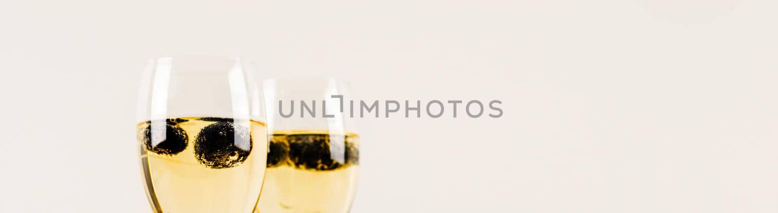 luxurious champagne in a glass, festive way of celebrating a new year or important events, toast with sparkling wine, bubbles