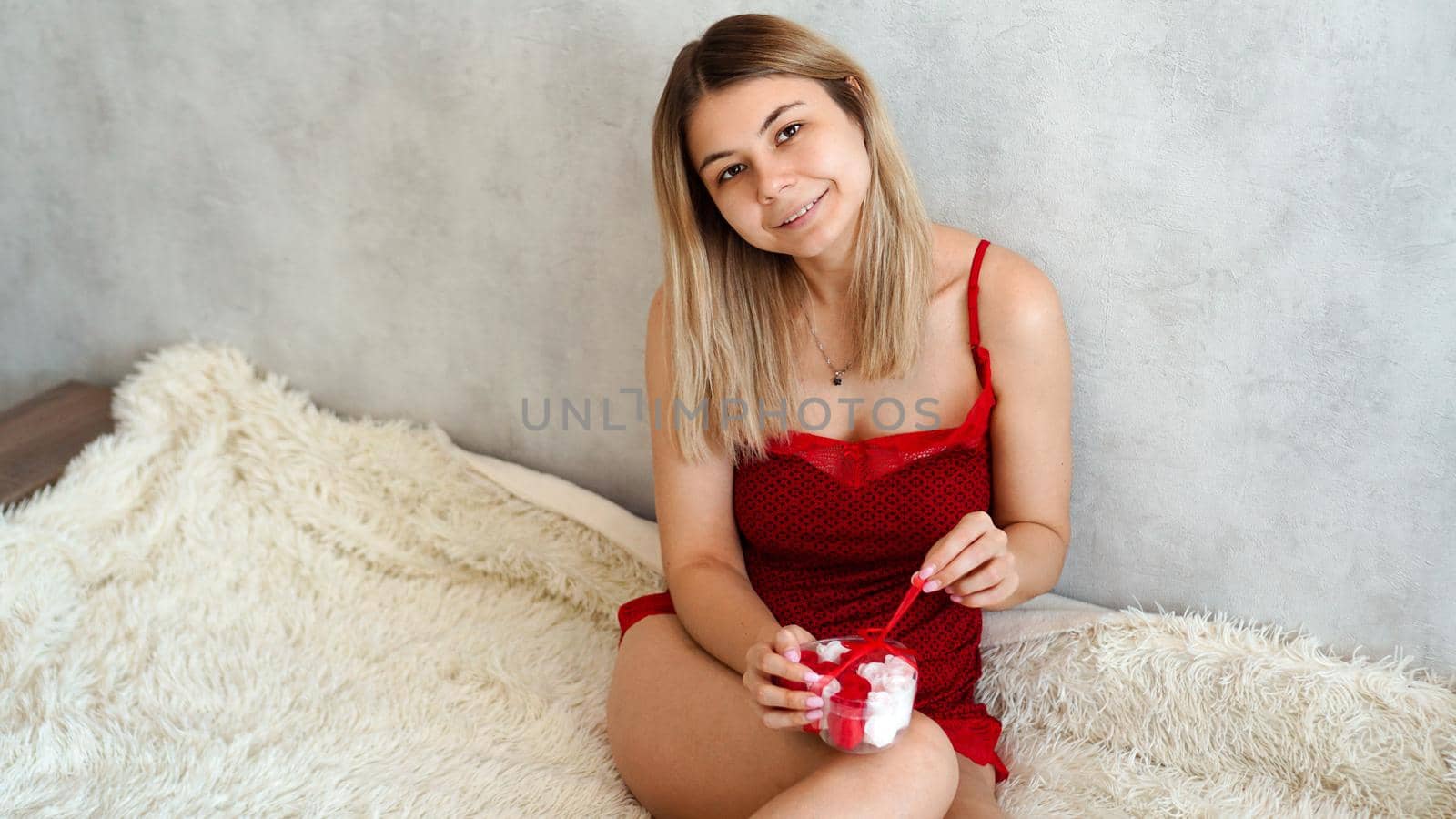 Portrait of cute girl receive gift box, enjoying present at home by natali_brill