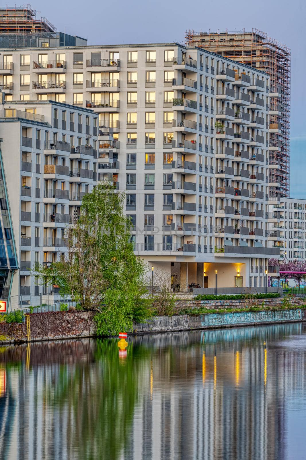 Big modern apartment building at the river Spree in Berlin, Germany
