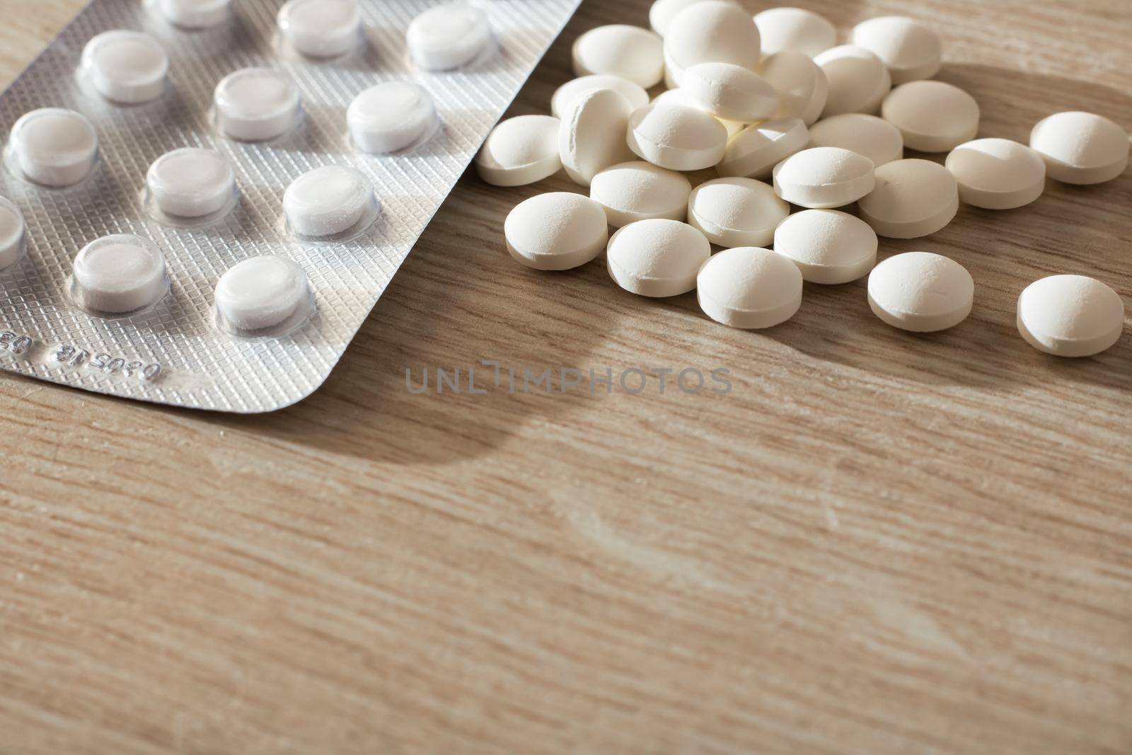 The blister with pills and round pills with copy space