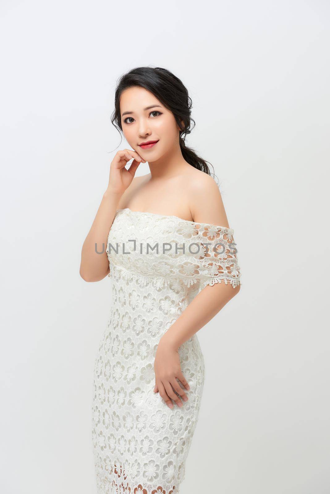 A beautiful girl with great figure in the white lace wedding dress by makidotvn