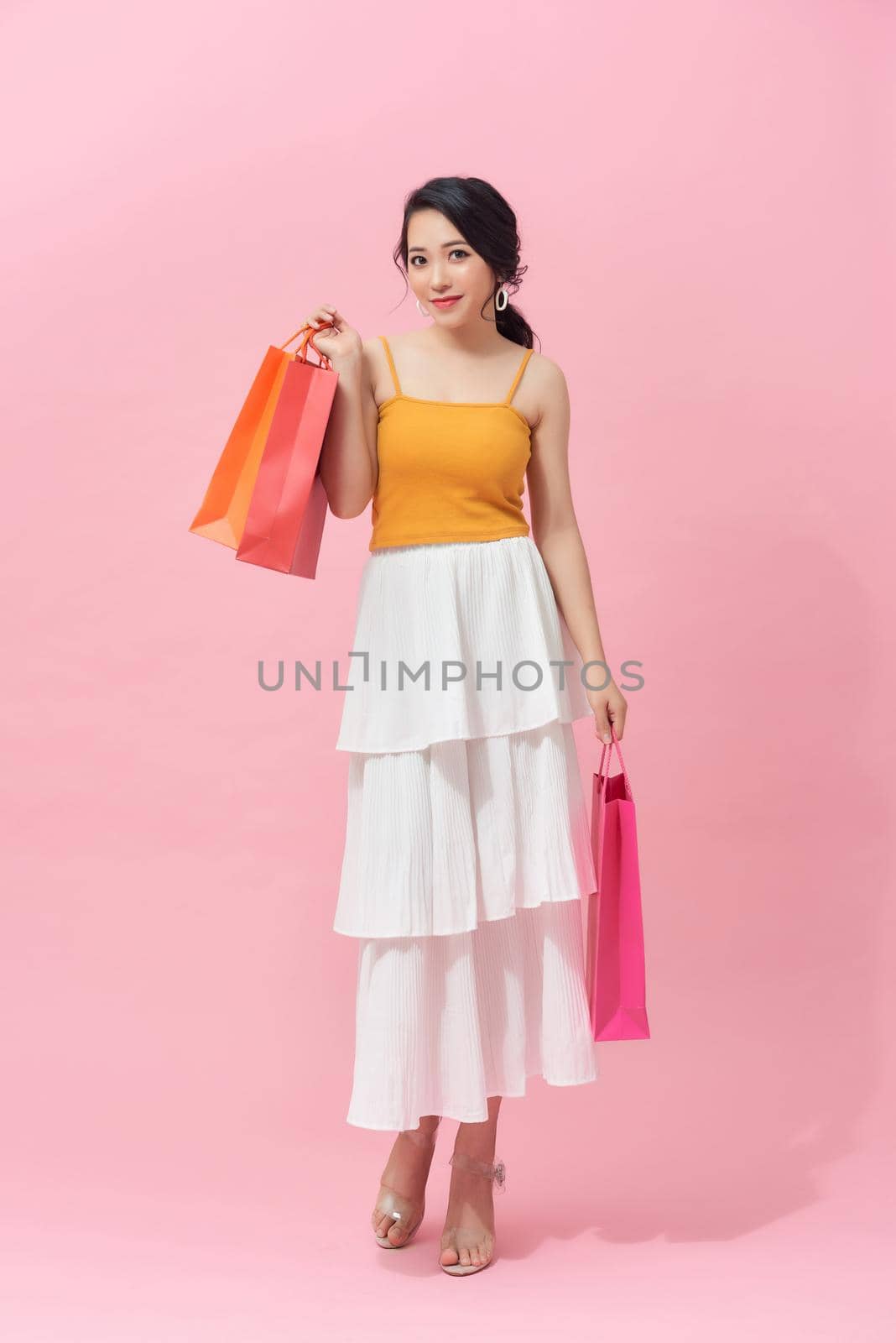 young woman with packages from shop