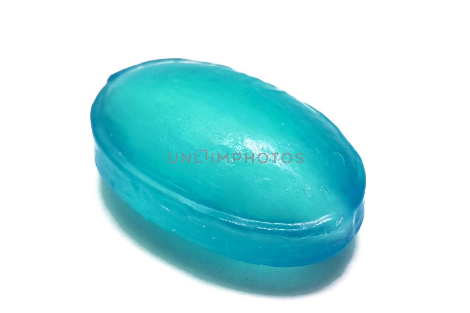 Blue candy lollipop close up, isolated on a white background