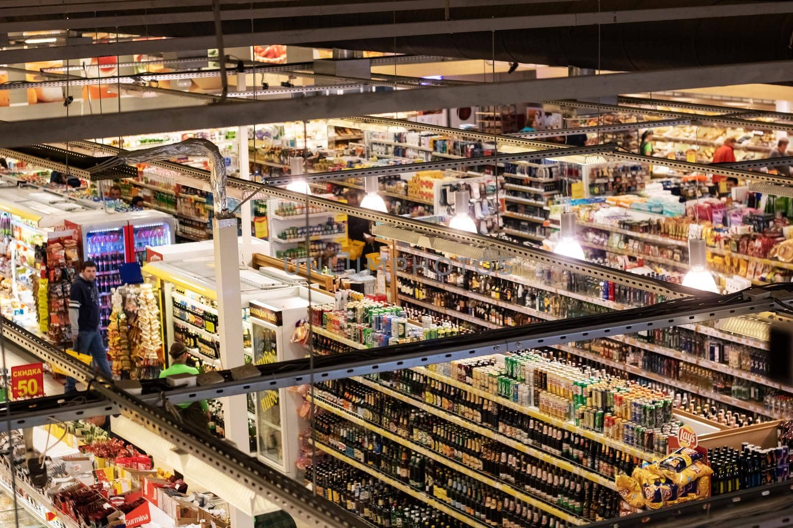 Belarus, Novopolotsk - July 10, 2019: Hall of the supermarket top view with people