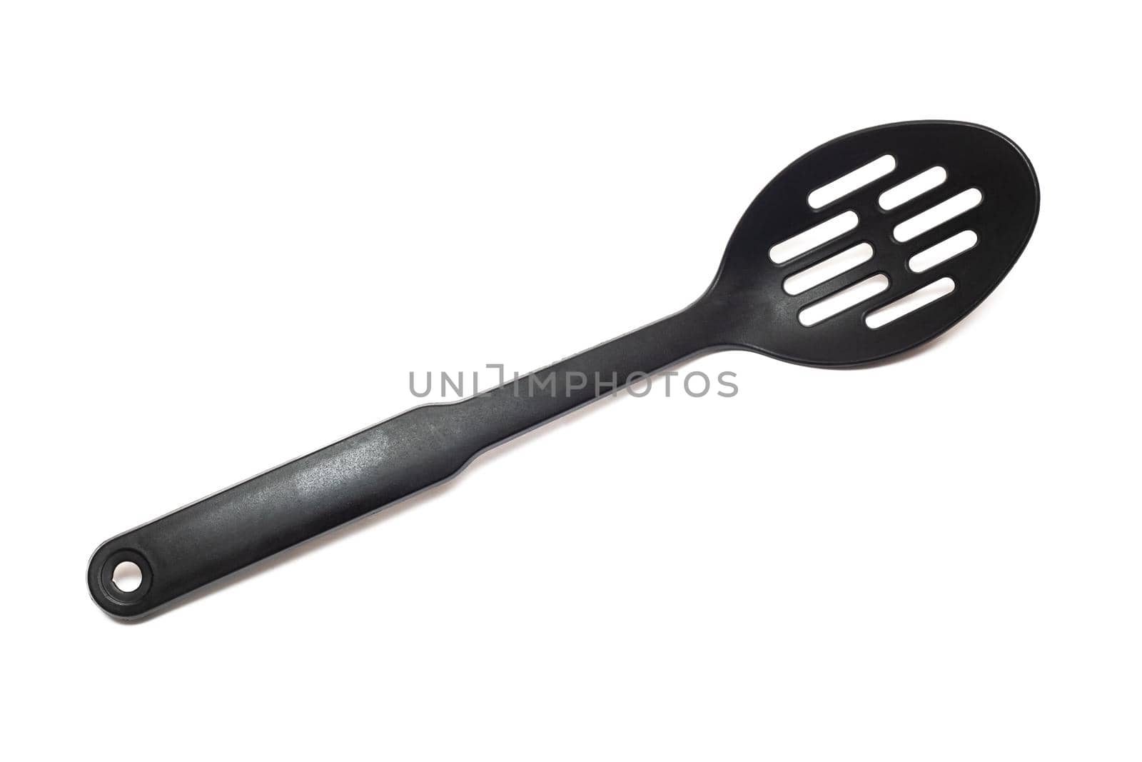 Kitchen black plastic colander, isolated on a white background