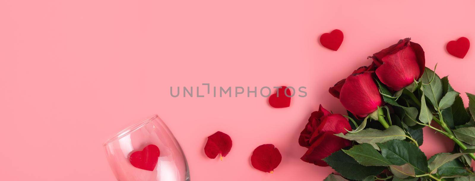 Valentine's Day design concept background with rose flower and gift box on pink background