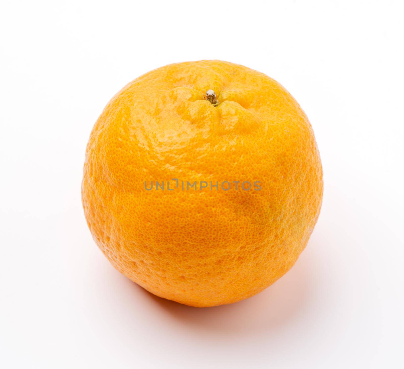 Beautiful tangerine isolated on white background, clipping path, cut out, close up.