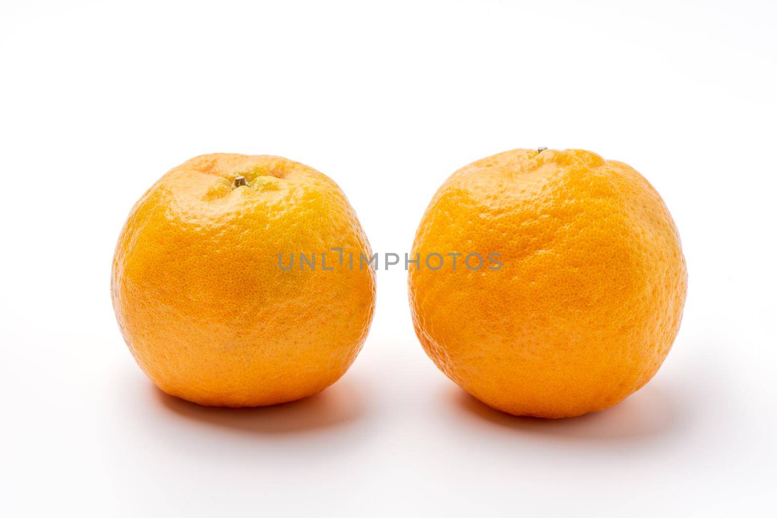 Beautiful tangerine isolated on white background, clipping path, cut out, close up.