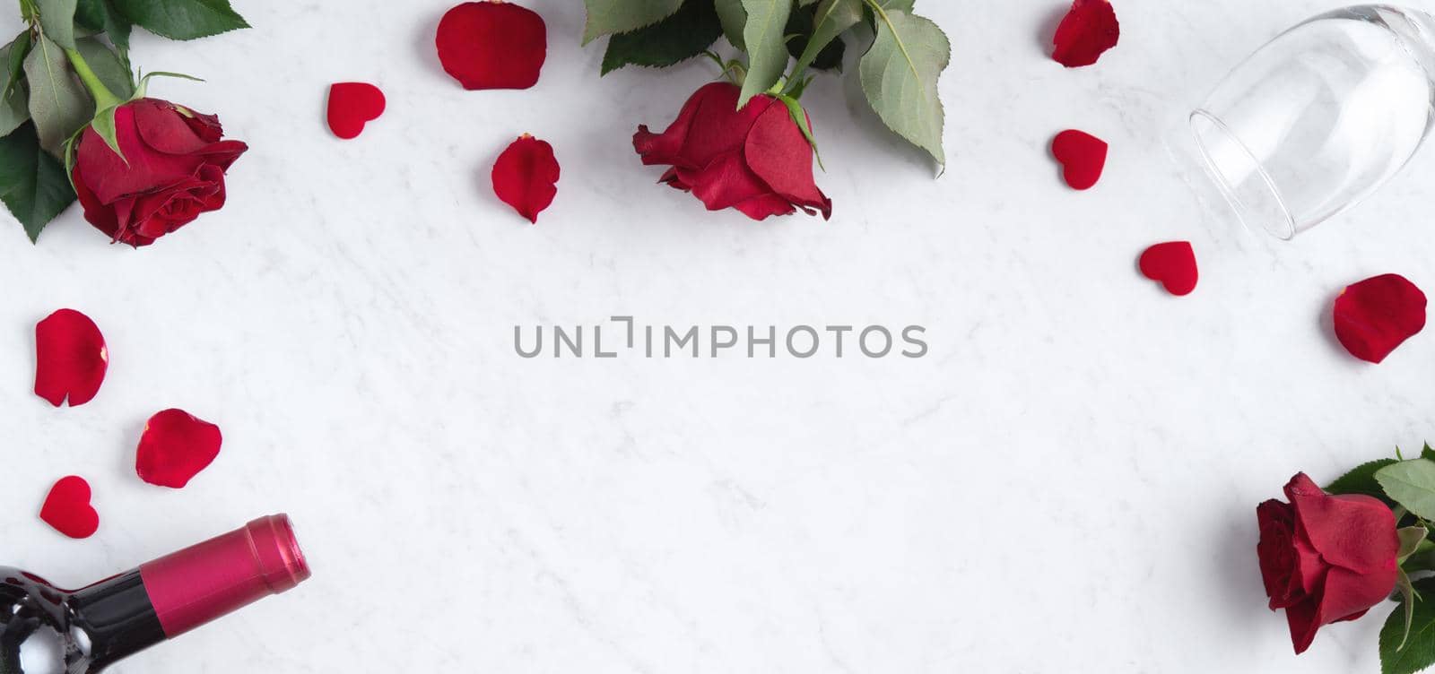 Top view of Valentine day concept with rose and wine, festive gift design concept by ROMIXIMAGE