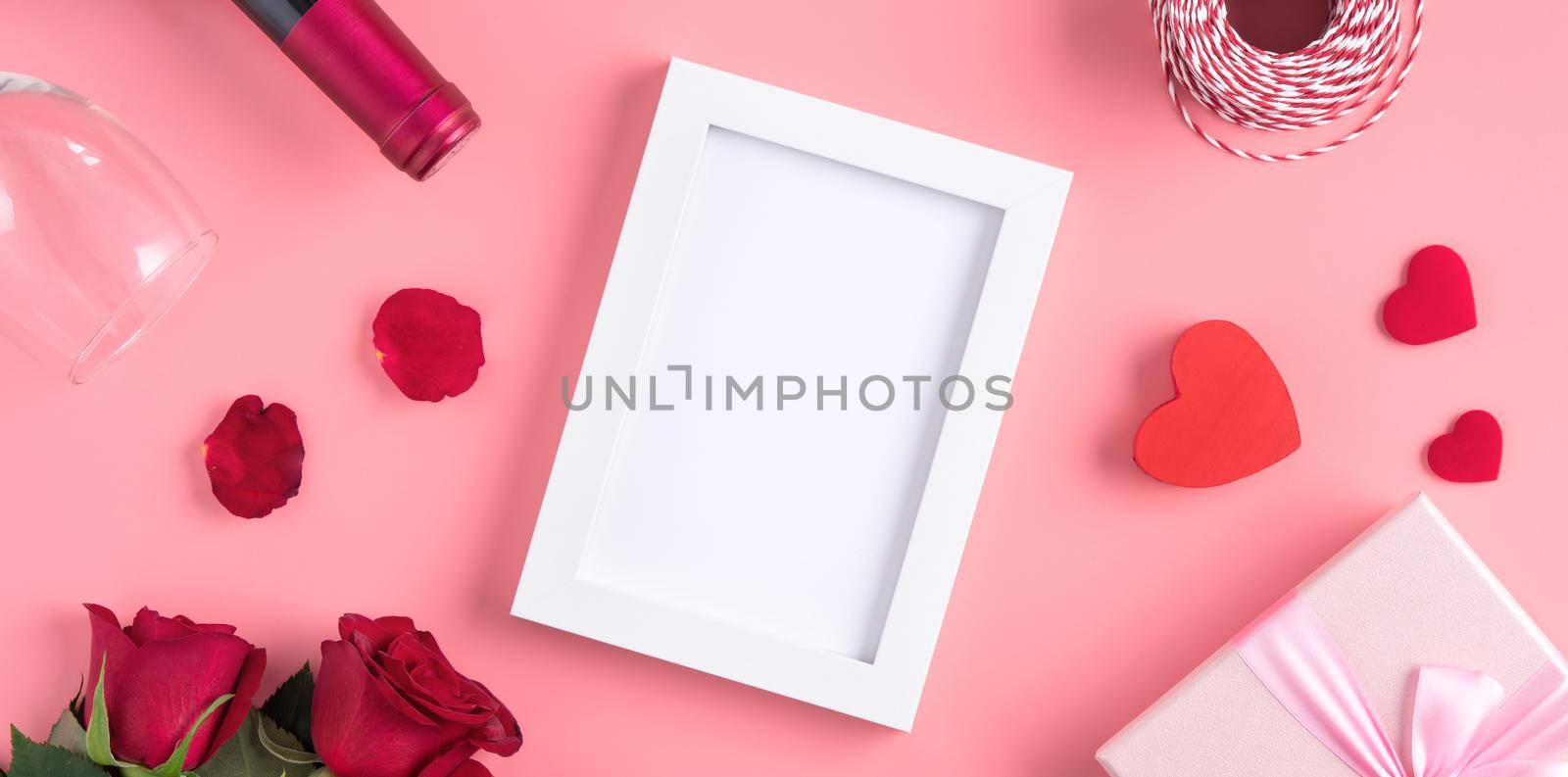 Valentine's Day memory with picture frame concept on pink background by ROMIXIMAGE