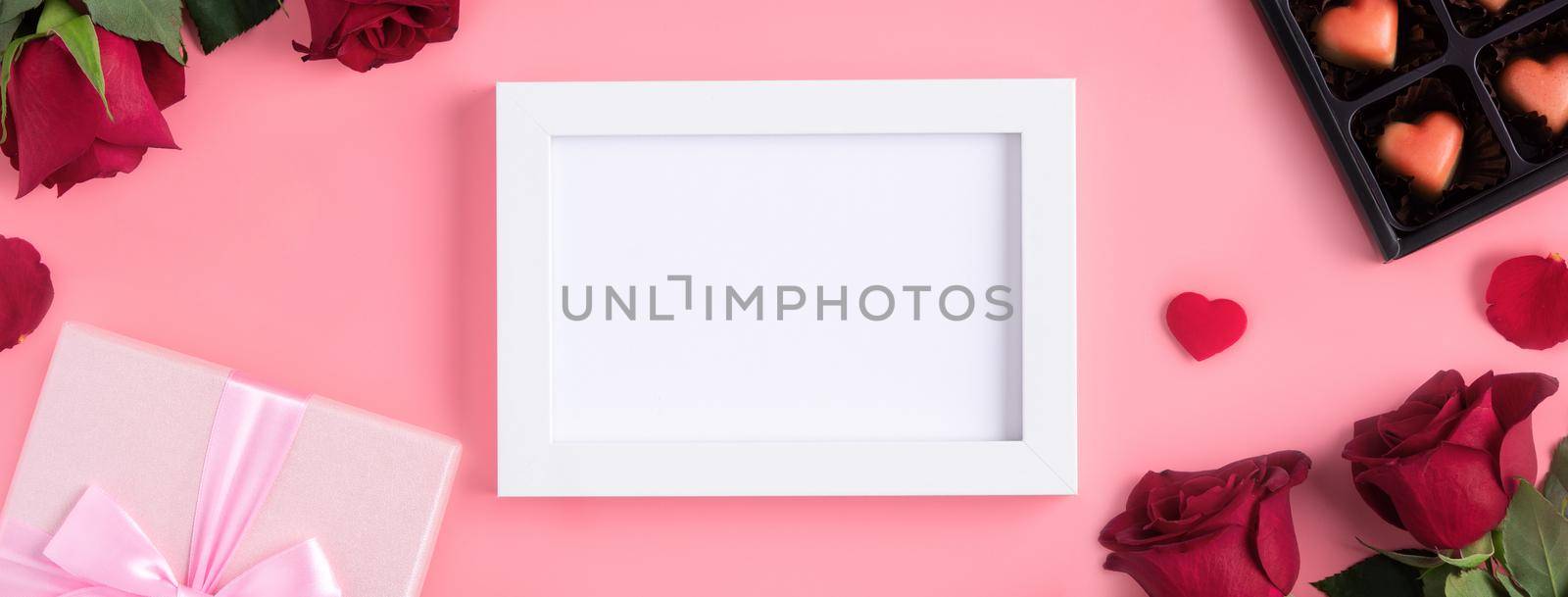 Valentine's Day memory with picture frame concept on pink background by ROMIXIMAGE