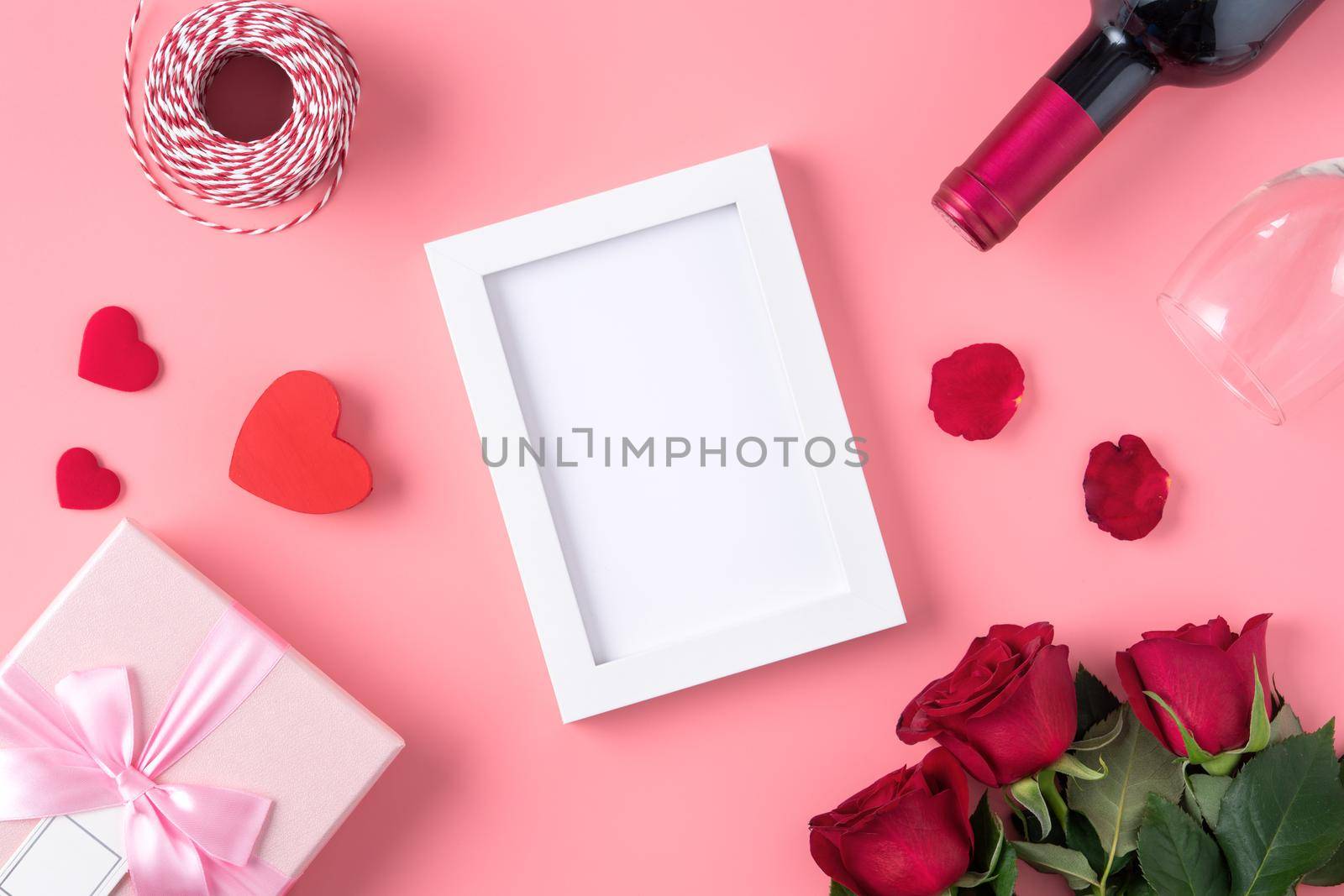 Valentine's Day memory with blank picture frame on pink background design concept