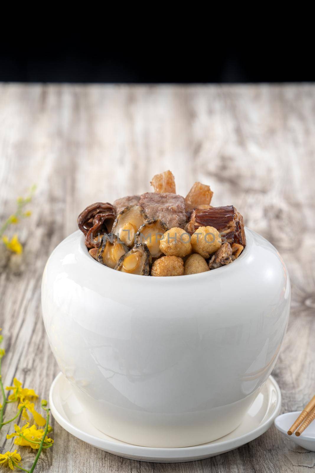Traditional food of Chinese lunar new year, Buddha jumps over the wall, Chinese Soup Casserole dish, Buddha's Temptation, named Fo Tiao Qiang, close up.