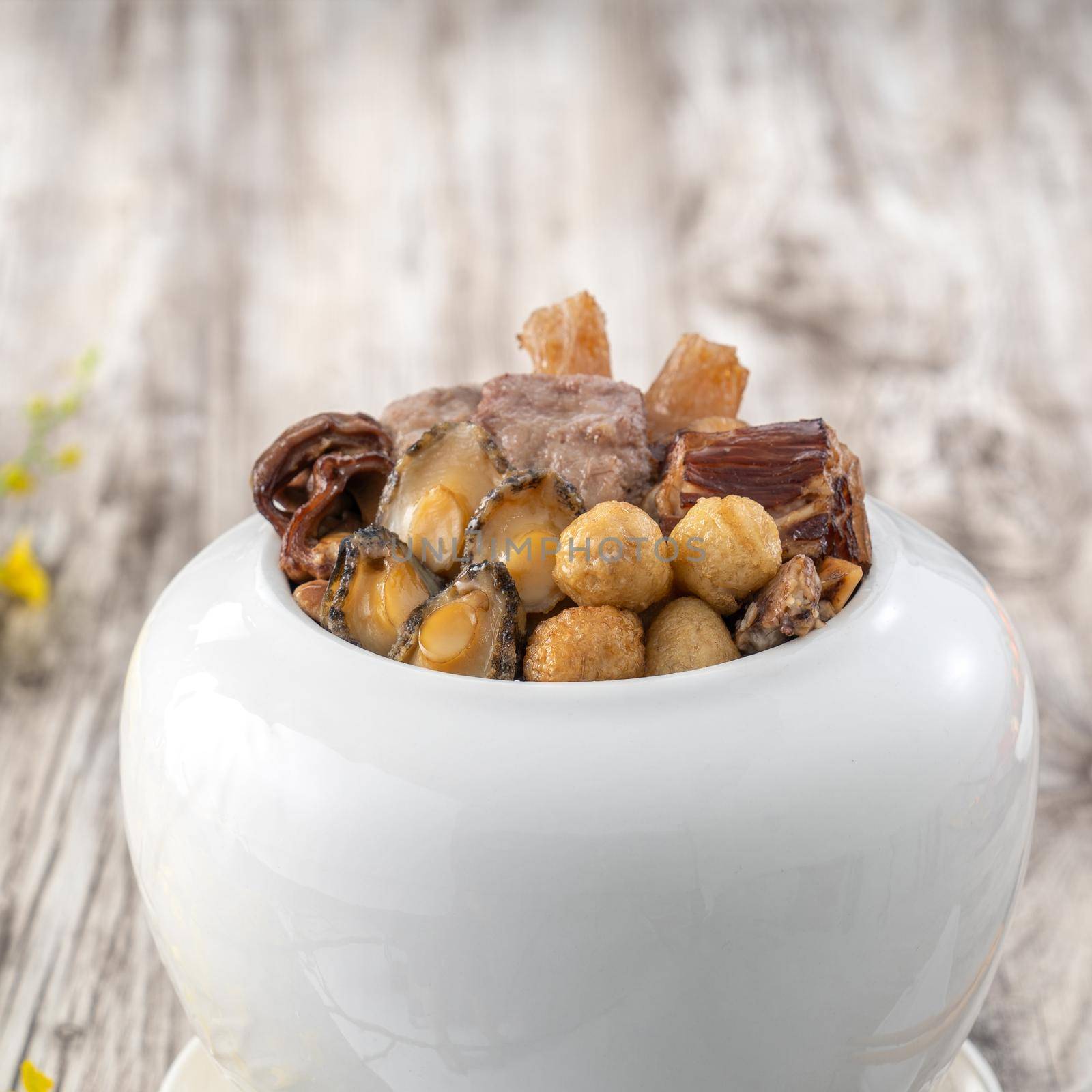 Traditional food of Chinese lunar new year, Buddha jumps over the wall, Chinese Soup Casserole dish, Buddha's Temptation, named Fo Tiao Qiang, close up.