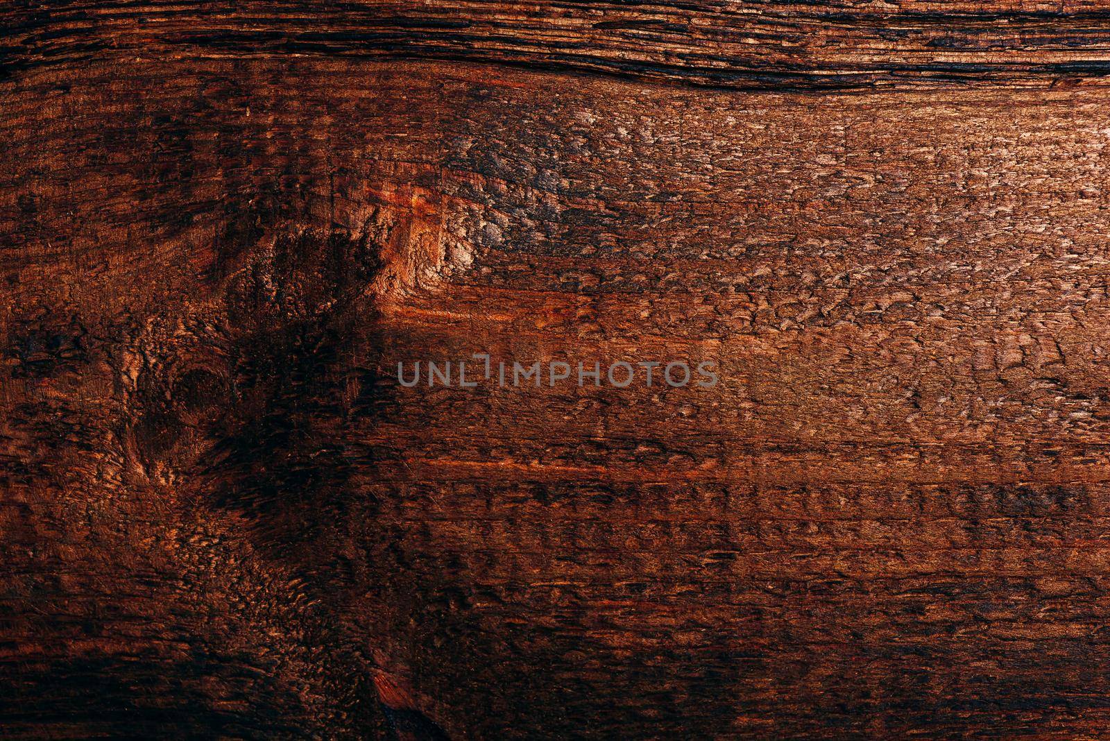 Old dark wooden surface. View from above