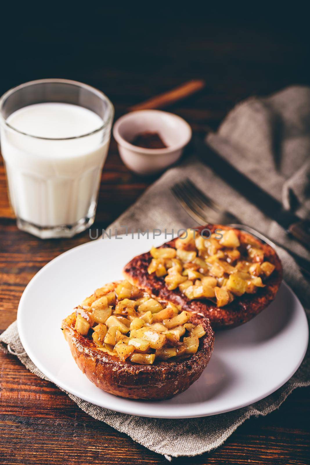 French toasts with chopped apple caramelized with cinnamon