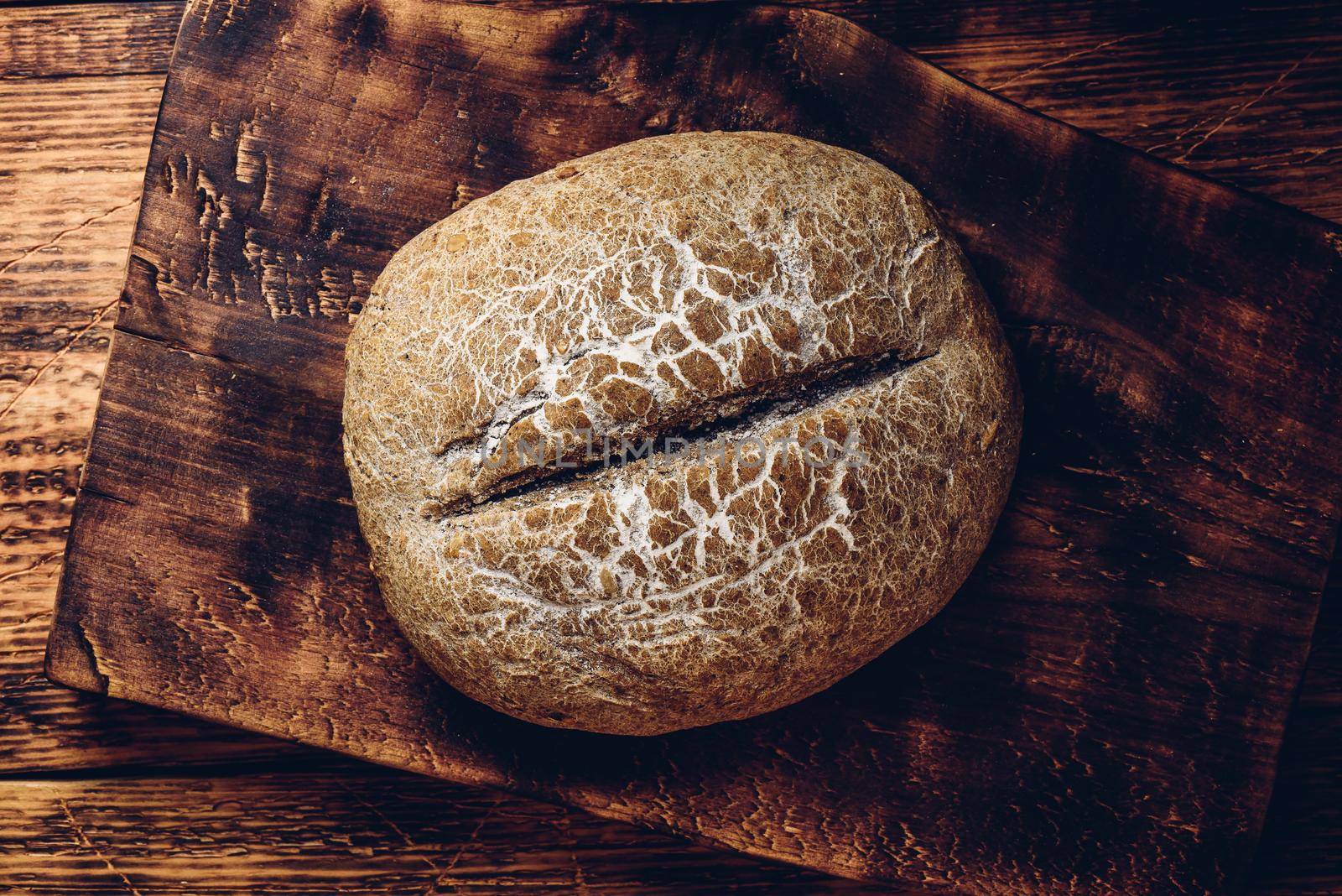 Freshly baked loaf of rye bread by Seva_blsv