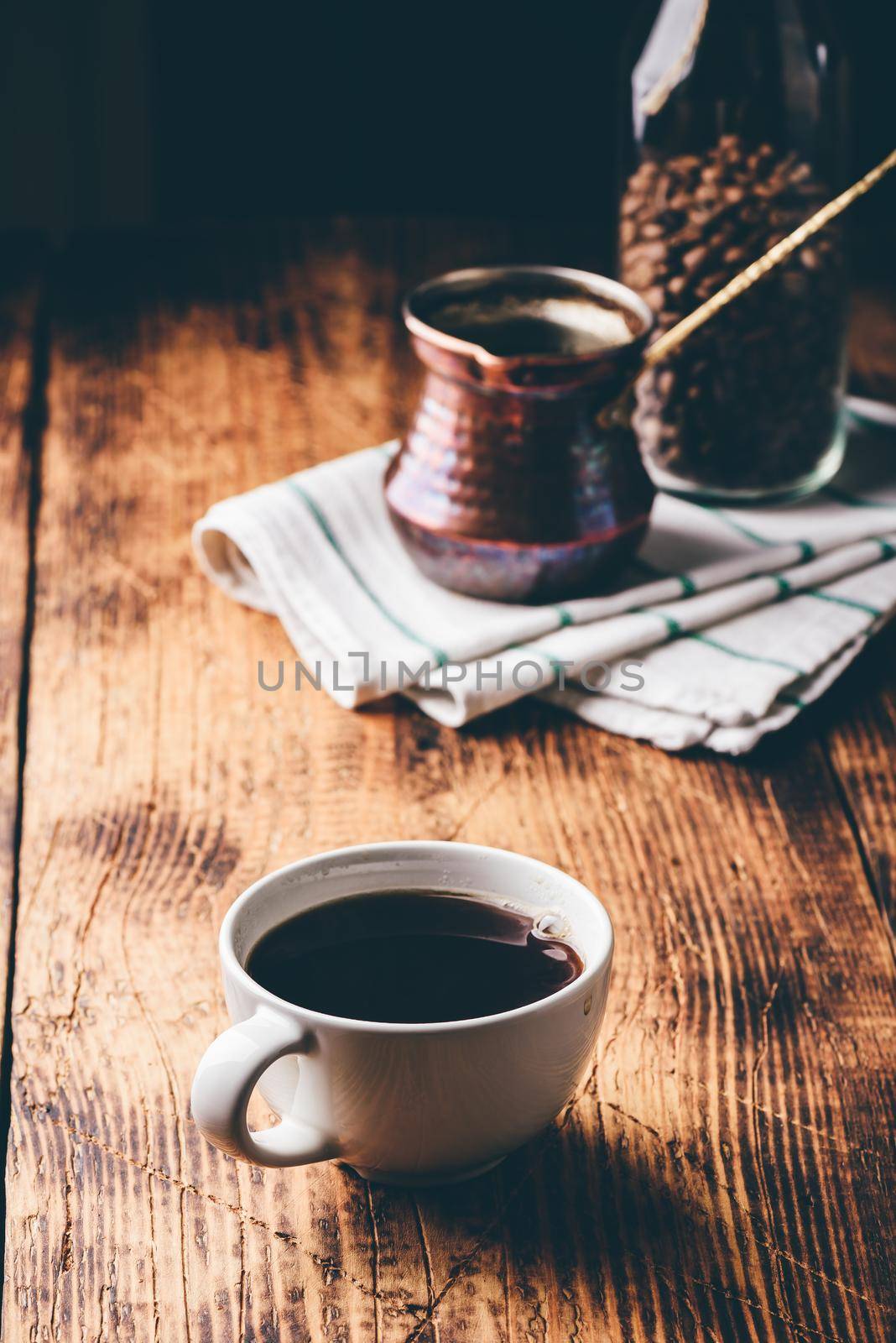 Cup of turkish coffee on wooden table by Seva_blsv