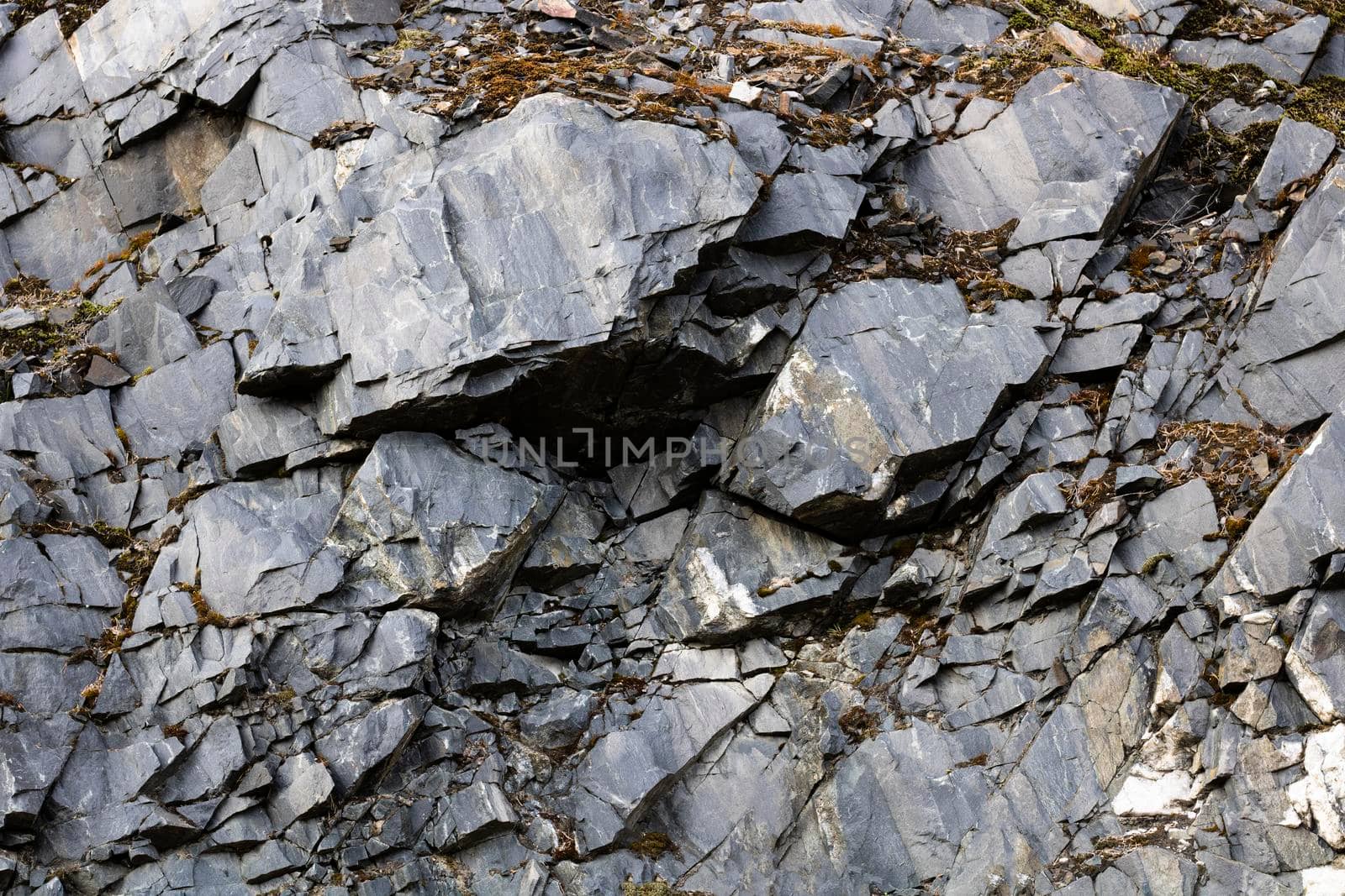 The texture of the rock is close-up in Karelia, an abstract stone background.