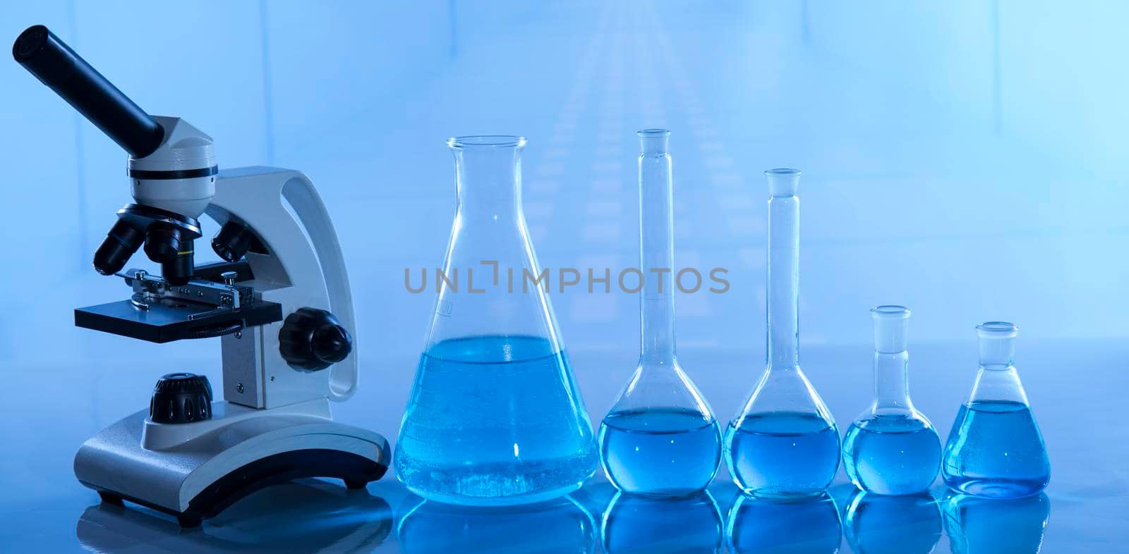 Scientific laboratory experimental glassware background by JanPietruszka
