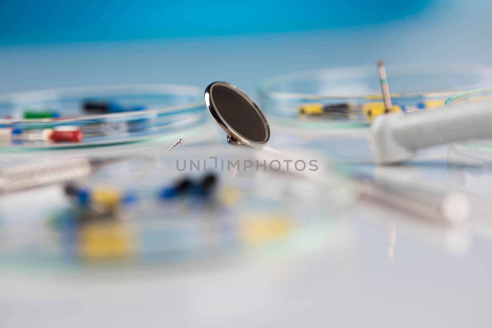 Dentist equipment on blue background