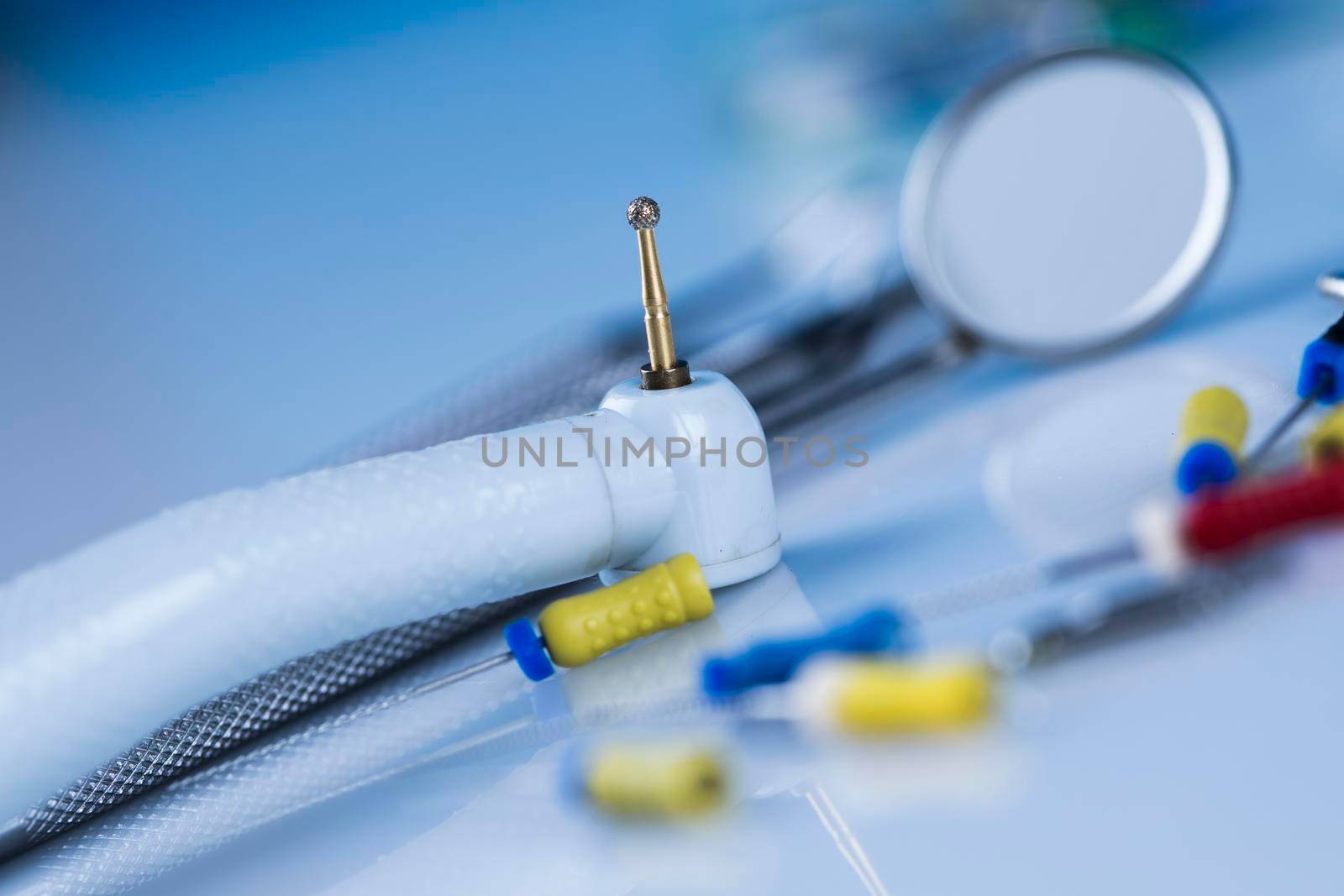 Dentist equipment on blue background