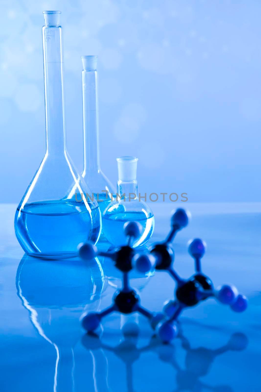 Laboratory beakers,Science experiment, blue background