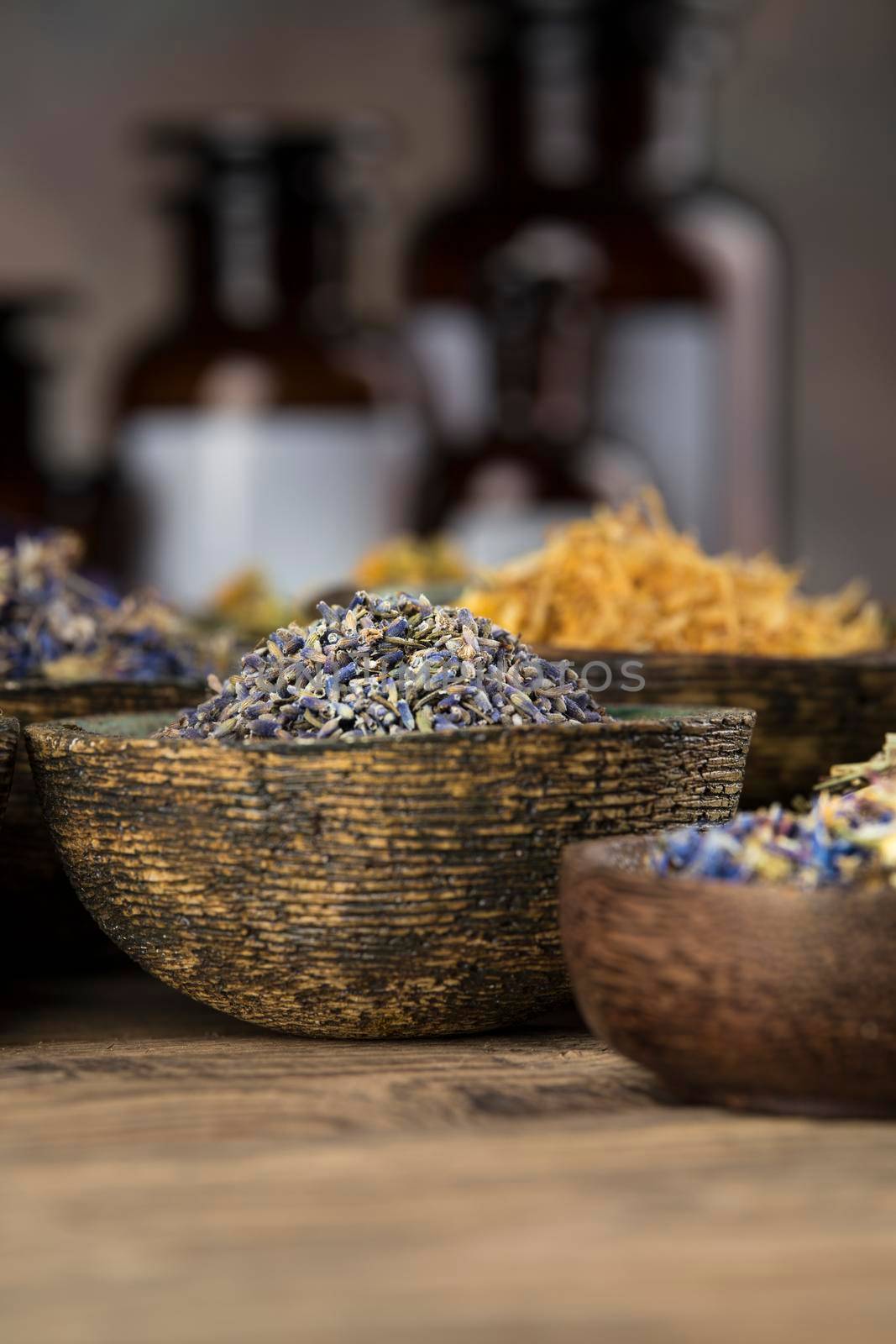 Natural medicine, wooden table background by JanPietruszka