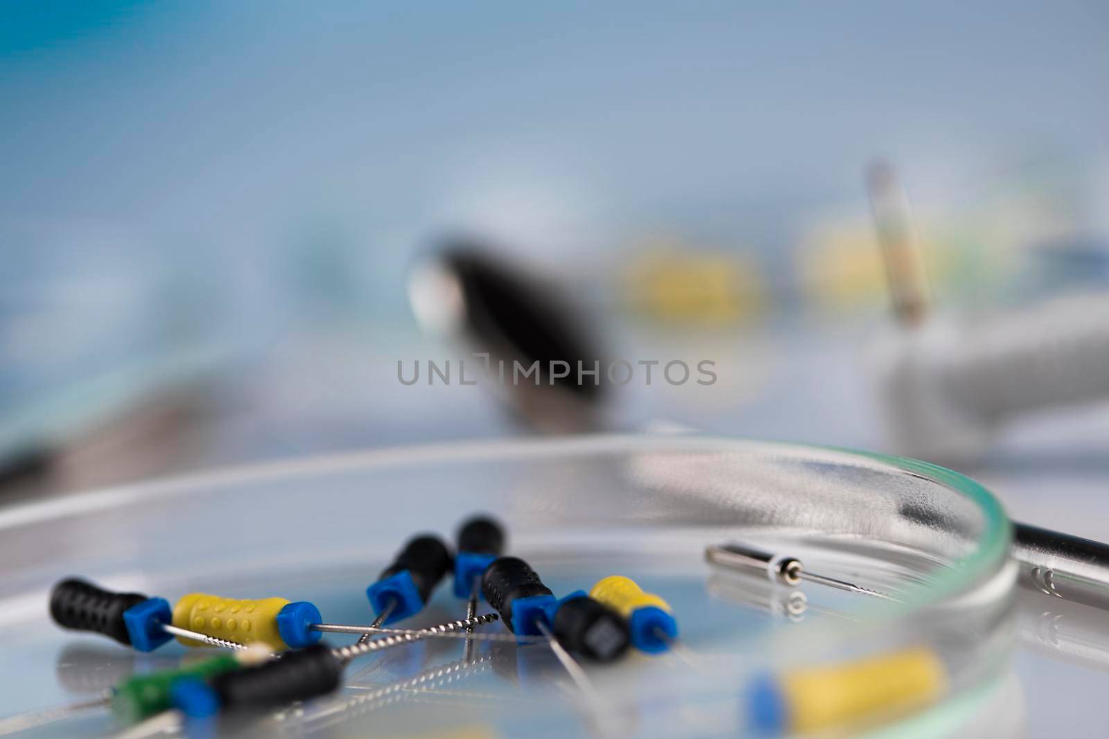 Dentist equipment on blue background