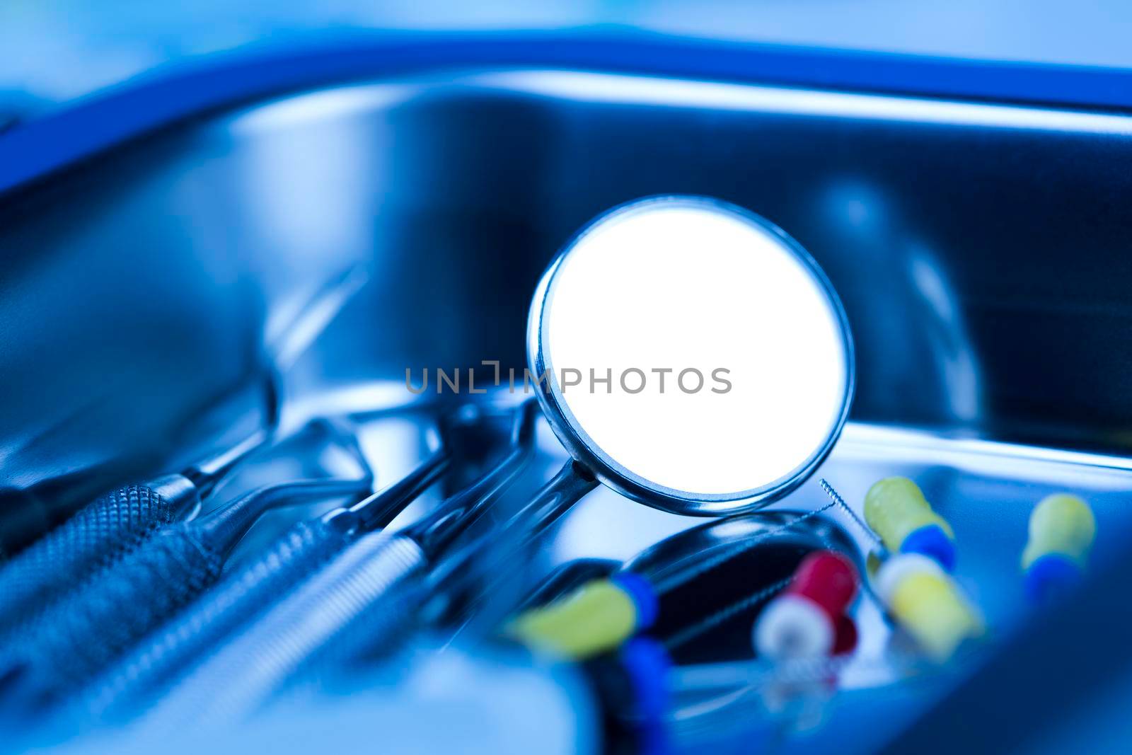 Dentist equipment on blue background