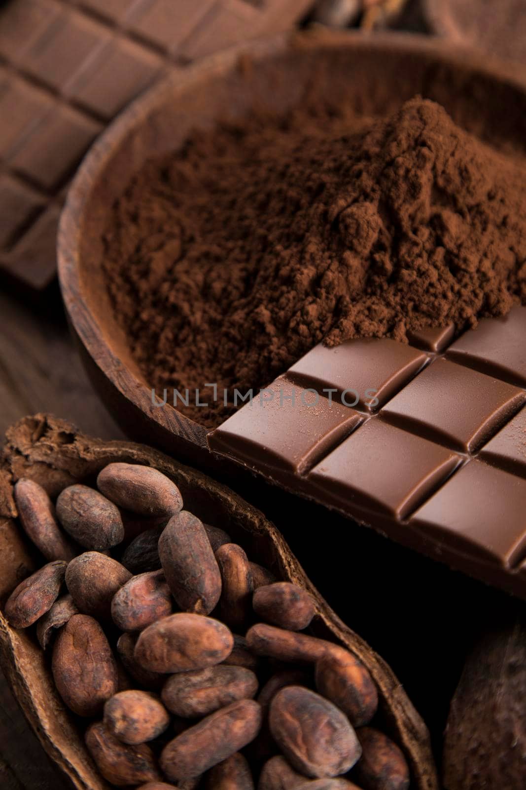 Chocolate bar, candy sweet, cacao beans and powder  by JanPietruszka