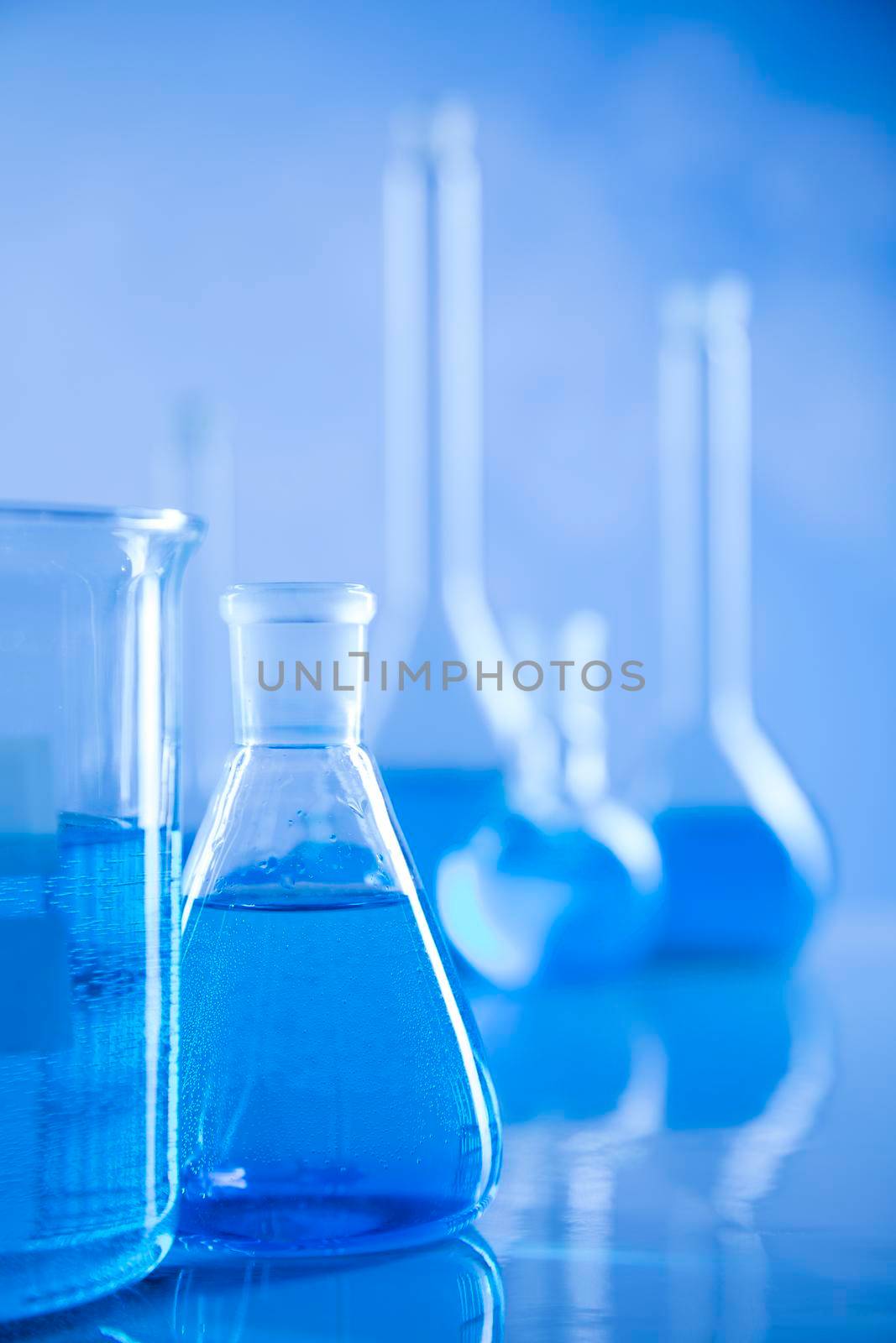 Laboratory equipment, glass filled background