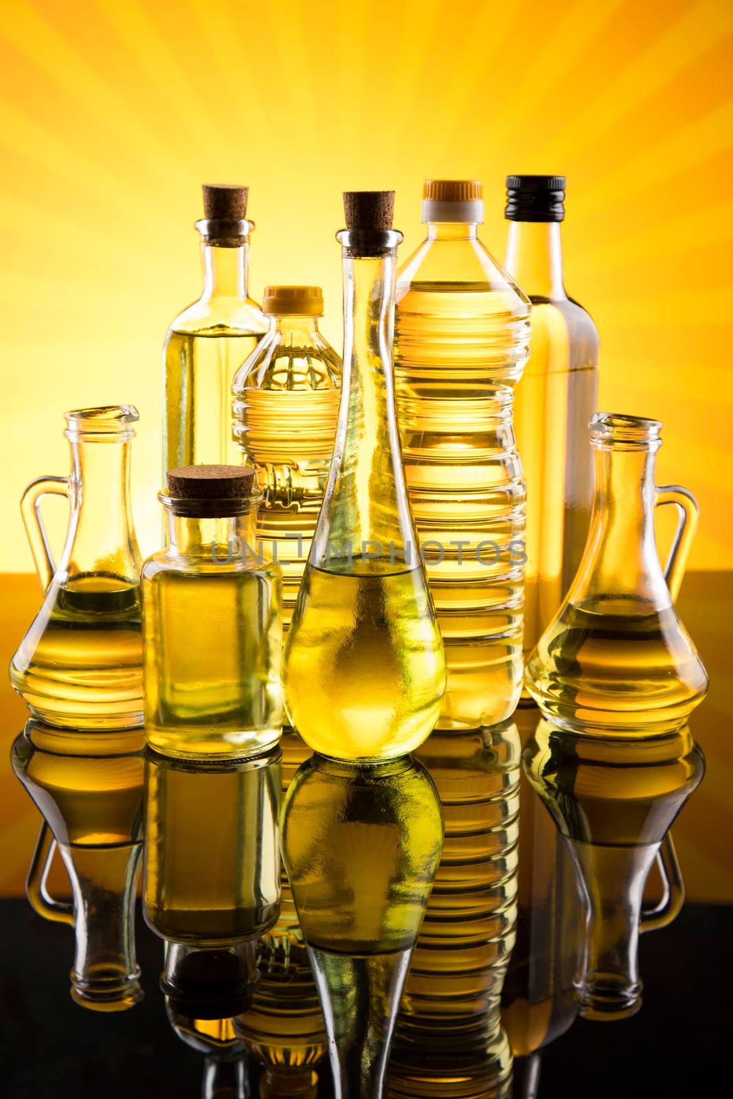Bottles with organic cooking olive oil by JanPietruszka