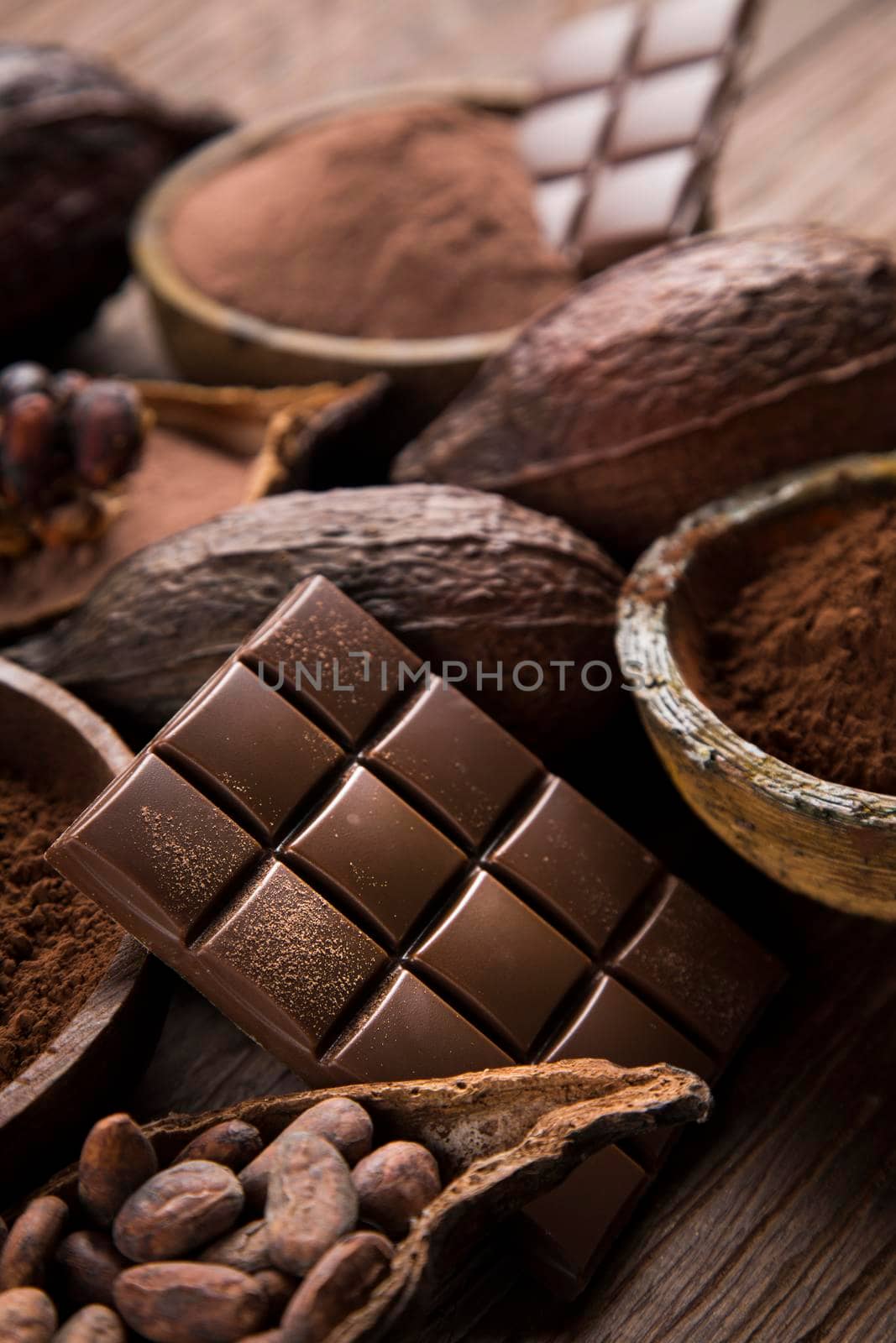 Chocolate bar, candy sweet, cacao beans and powder  by JanPietruszka