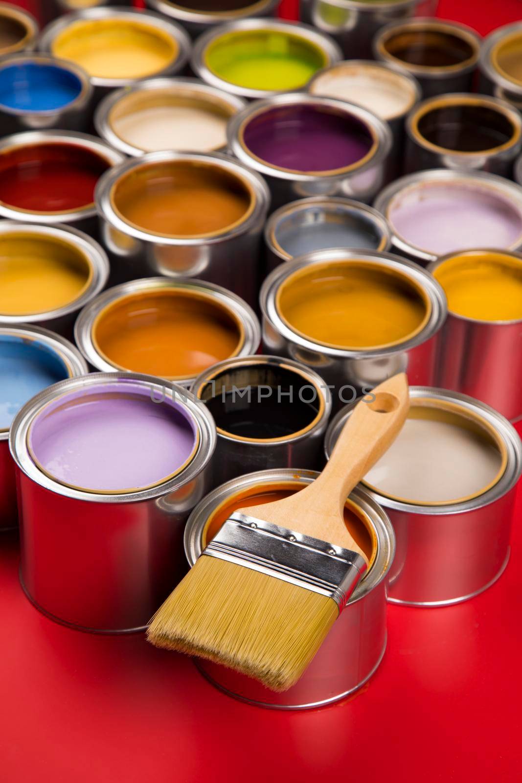 Paint can with a paintbrush by JanPietruszka