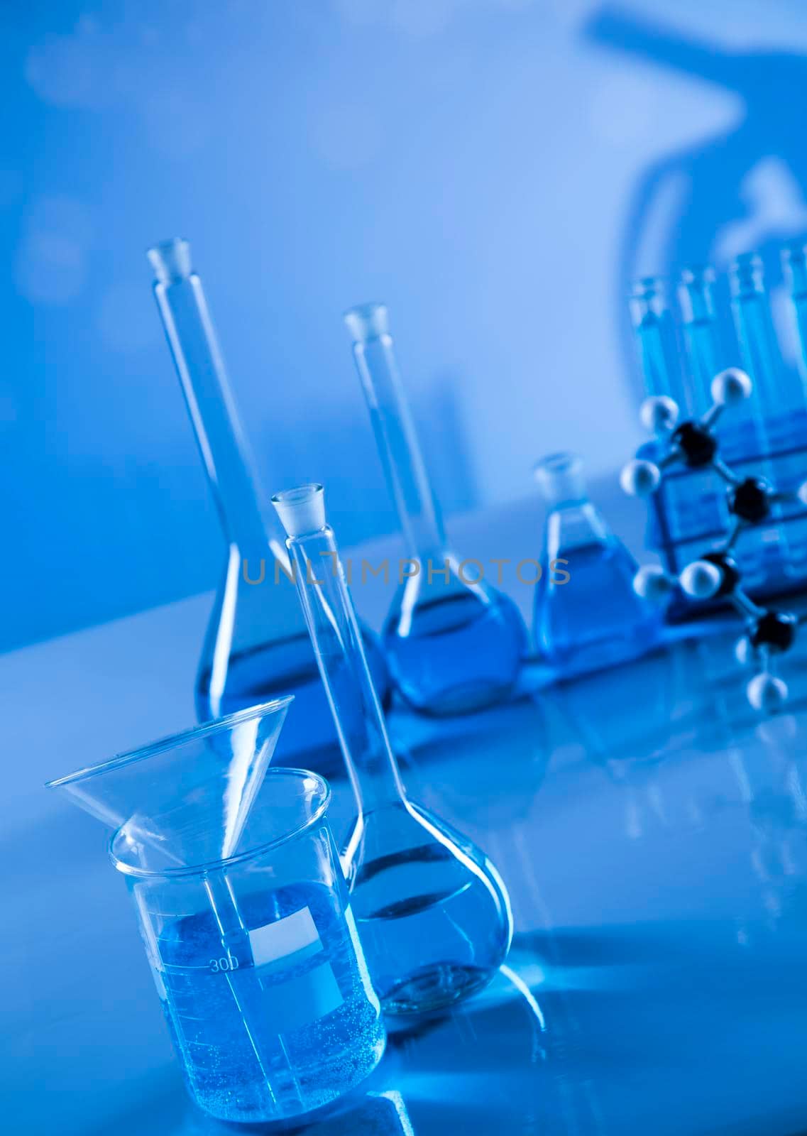 Laboratory equipment, glass filled background