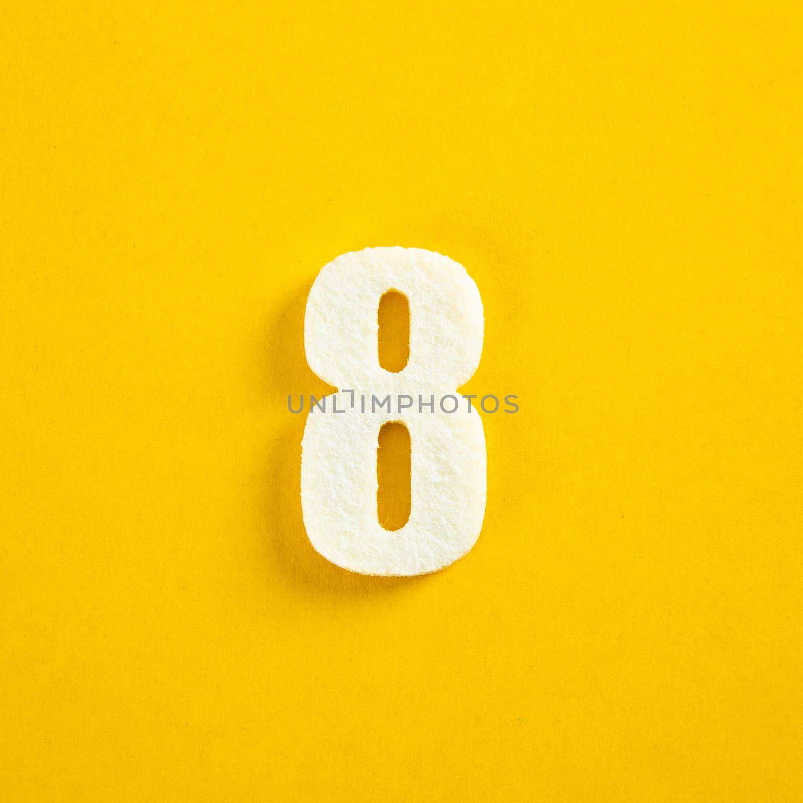 colorful number on yellow background